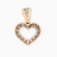 Colgante de Diamantes Corazón Abierto Oro Amarillo y Blanco 18 quilates
