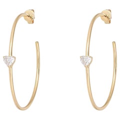 Pendientes de aro con forma de corazón de oro amarillo de 14 quilates y diamante de 0,57 quilates