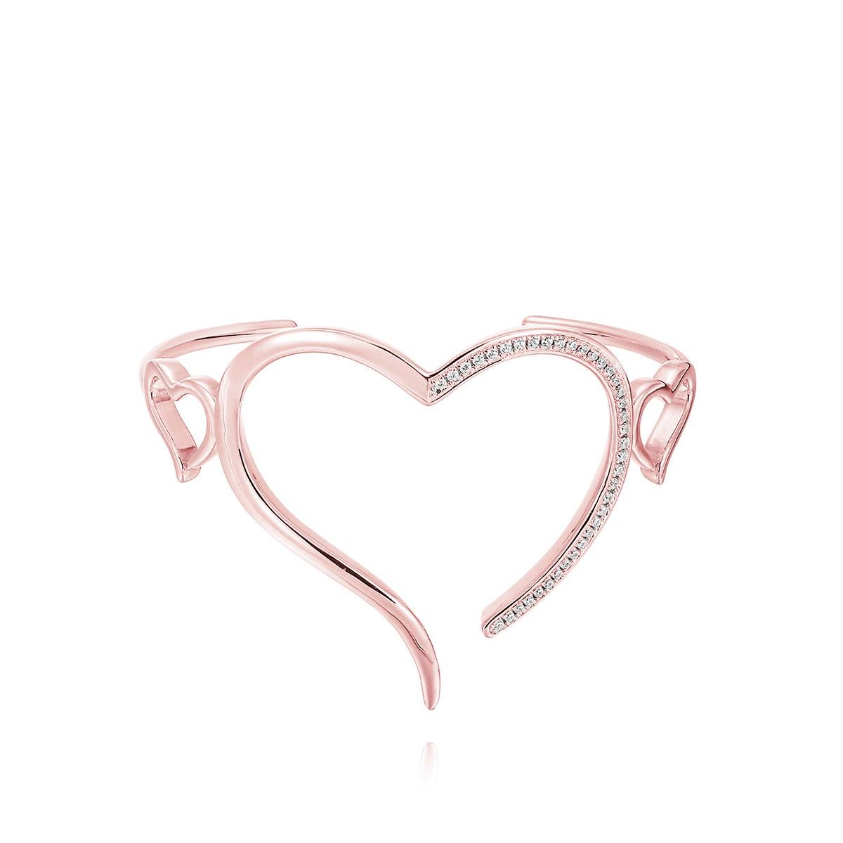 Follow your heart to chart your own path. This elegant, slimline open heart wire cuff shows your openness for love and all the beauty that surrounds you; transitioning easily from day to night. .925 sterling silver base. Also available in 24k yellow