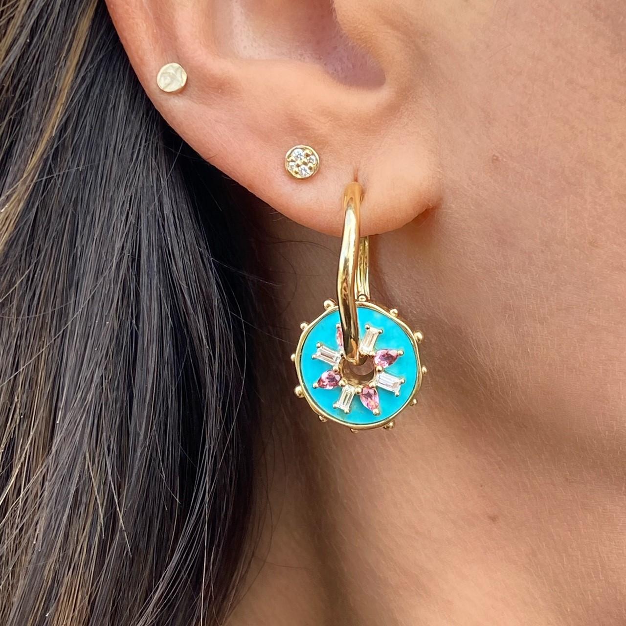 Your love is colorful just like the Open Love Explosion Tablet Discs. A turquoise tablet, vibrant pink tourmaline and baguette diamonds make this stunning disc perfect to add to a Three Stories Hoop Earring or worn on a chain as a pendant necklace.