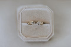 Open ring with pear diamonds