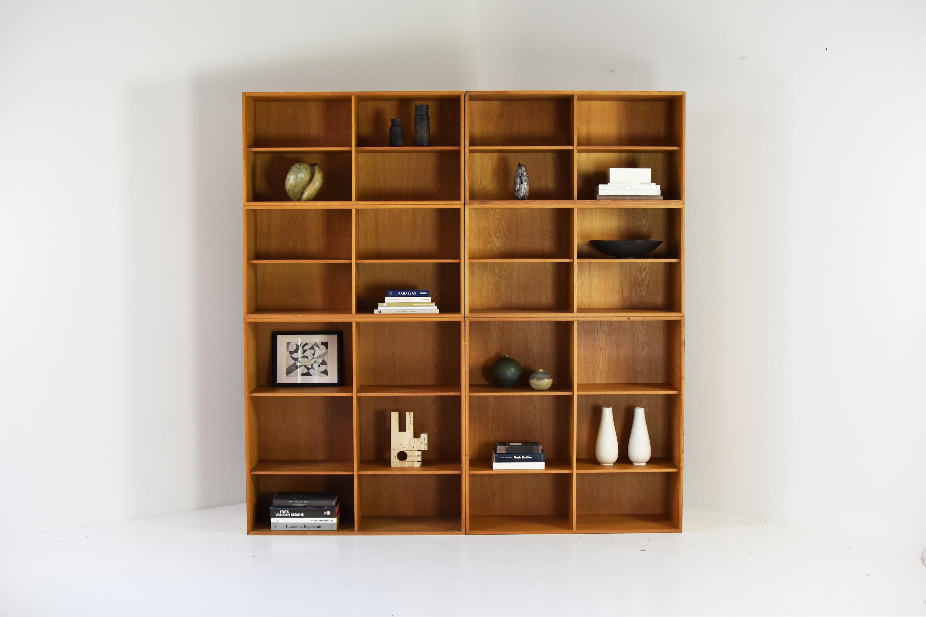 Open storage cabinets by Rud Thygesen for HG Furniture, Denmark 1960s. This unit consist of 6 cabinets in oak with adjustable shelves. Multiple set-ups are possible. Labeled on the back. Good original condition with some visible wear from age and