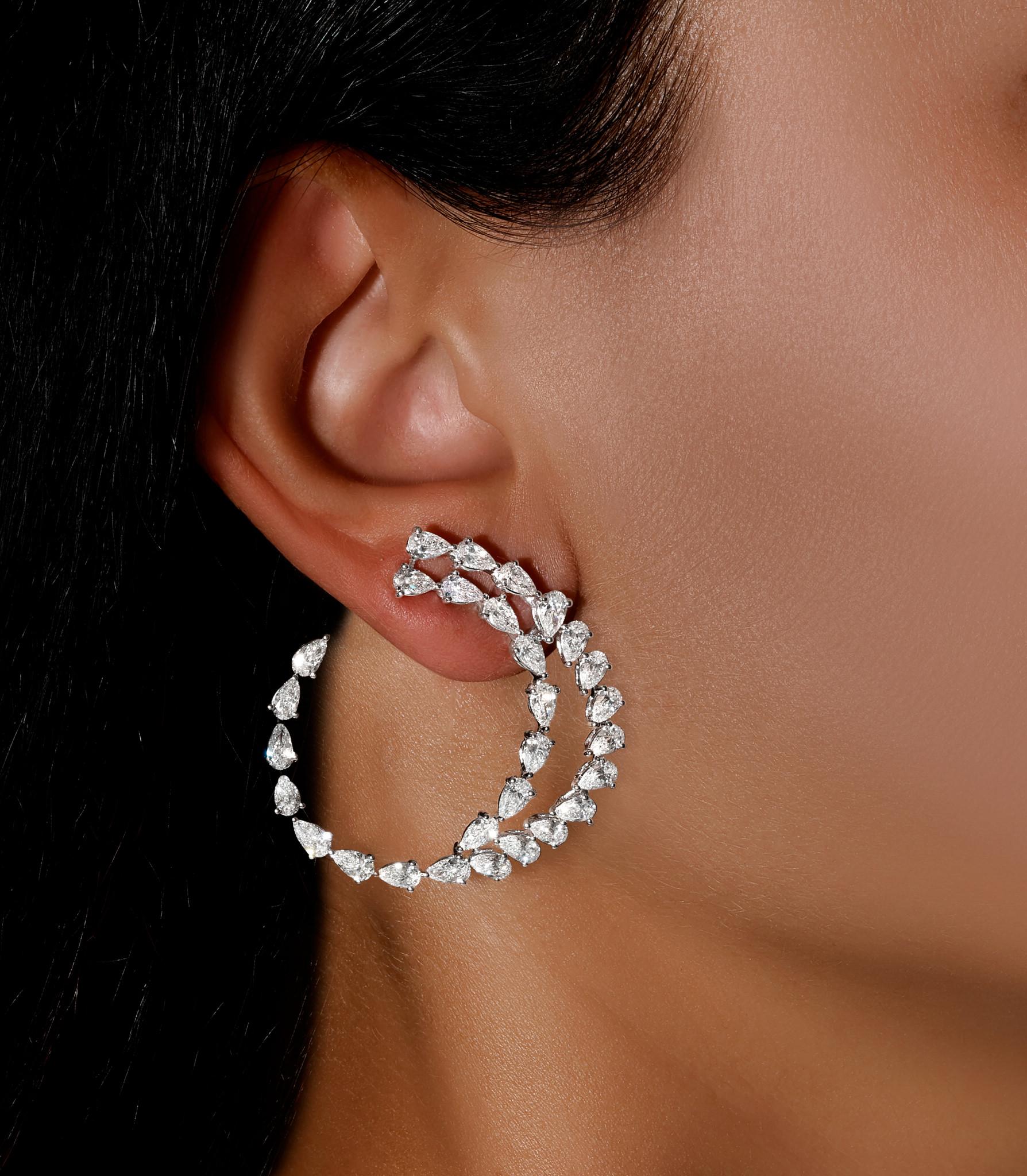 It comes with the Gemological Appraisal by GIA GG/AJP
All Gemstones are Natural
58 Diamonds = 8.03 Carats
Cut: Pear
Metal: 18K White Gold