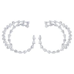 Créoles tourbillonnantes ouvertes en or blanc 18 carats avec diamants taille poire de 8 carats au total