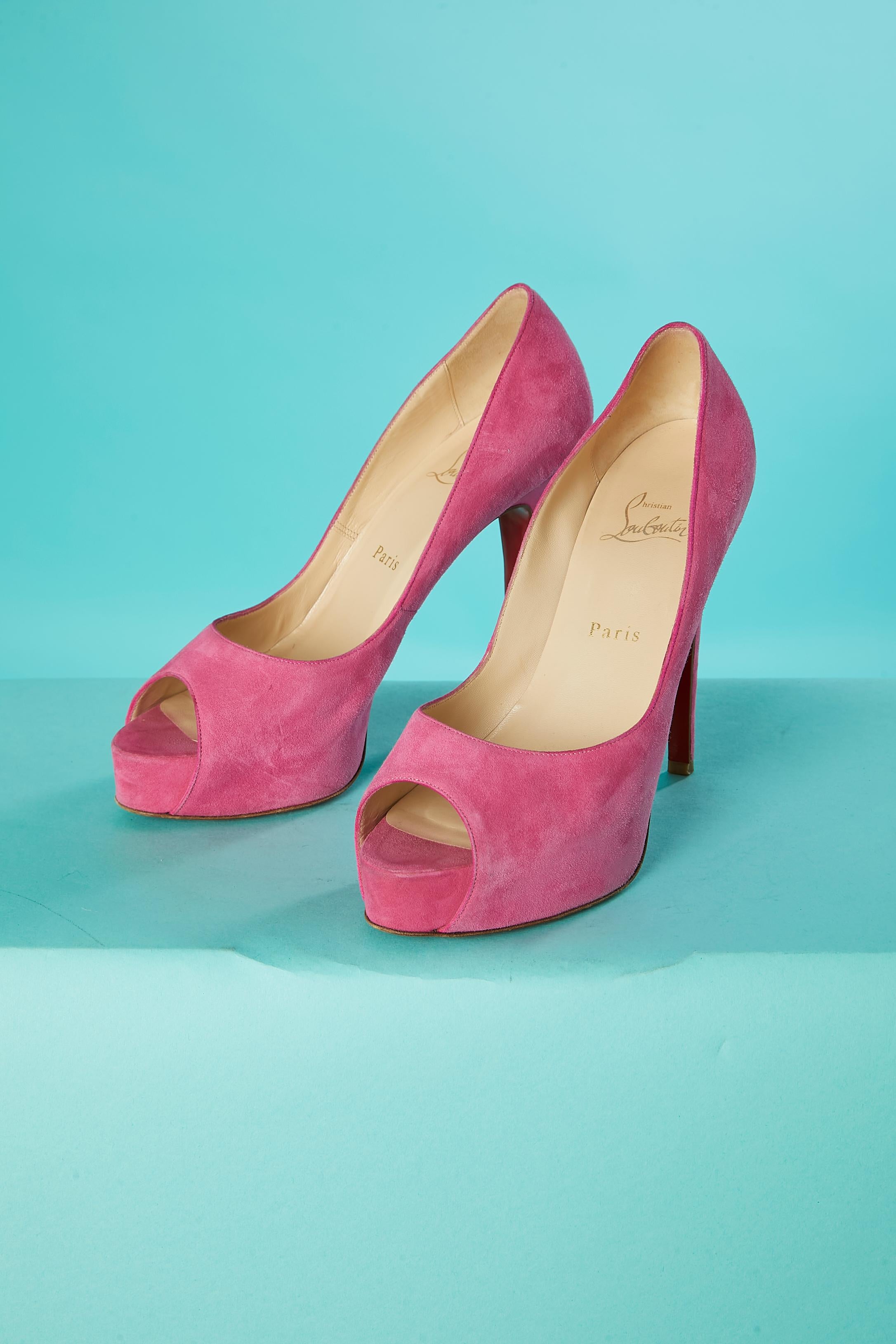 Open-toe pink suede pump. 
Heels height = 12 cm
Plateform = 2,5 cm
 Shoe size = 38 1/2 