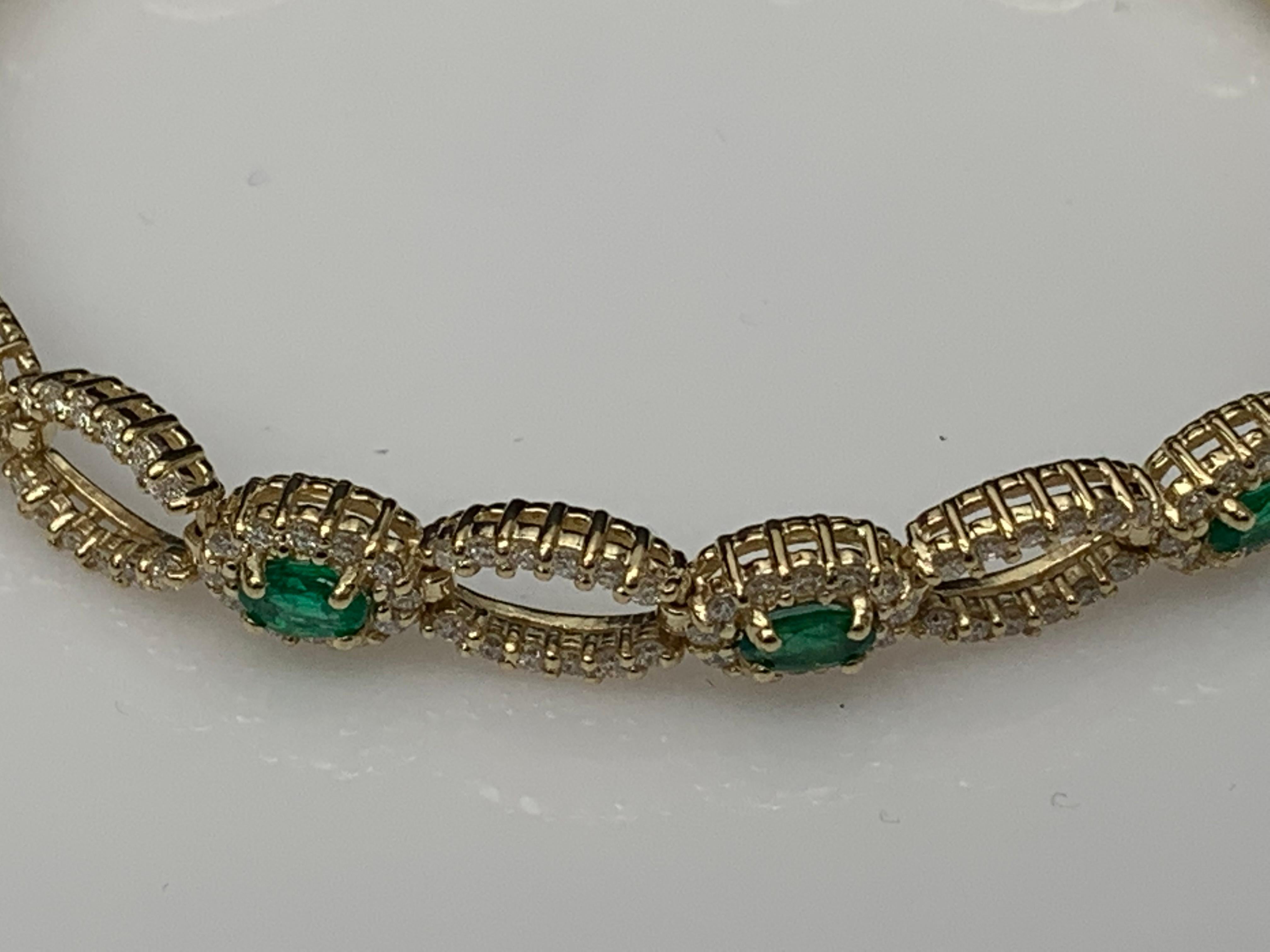 Brilliant Cut Open-Work 2.13 Carat Emerald and Diamond Bracelet in 14K Yellow Gold For Sale