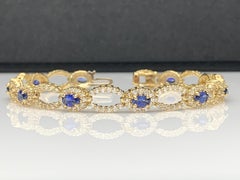 Bracciale Open-Work con zaffiro blu e diamante da 3,60 carati in oro giallo 14K