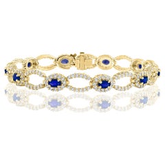 Armband aus 14 Karat Gelbgold mit durchbrochenem 3,60 Karat blauem Saphir und Diamant