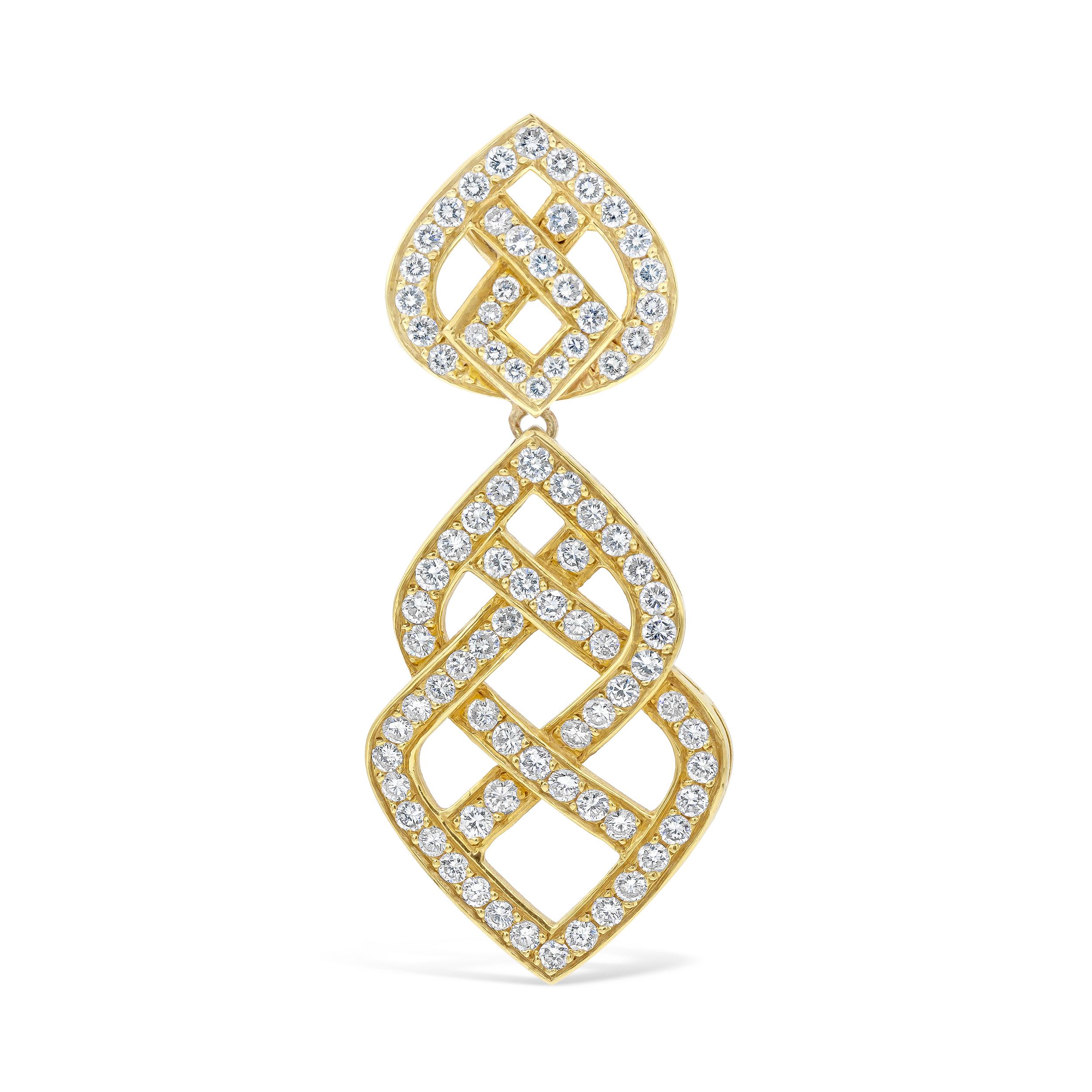 Showcasing an exquisite and fashionable dangle earrings set with brilliant round cut  diamonds that elegantly intertwine in an open-work design. Diamonds weigh 6.44 carats total and Finely made in 18k yellow gold.

Style available in different price