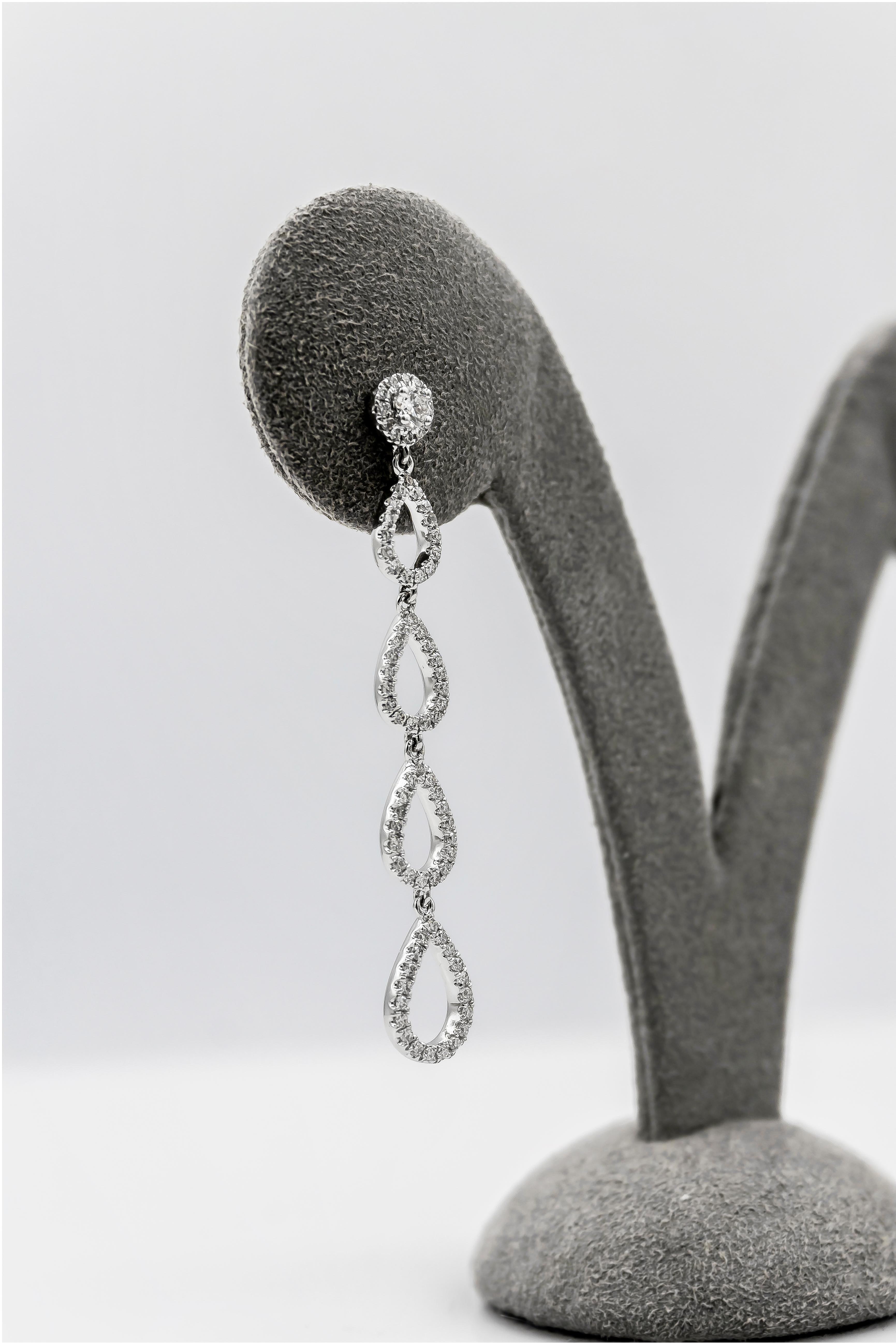 A stylish pair of drop earrings features four open-work pear shape designs encrusted with round brilliant diamonds. Attached to a post set with a round diamond in a halo. Total weight of diamonds is 0.63 carats diamonds.

Roman Malakov is a custom