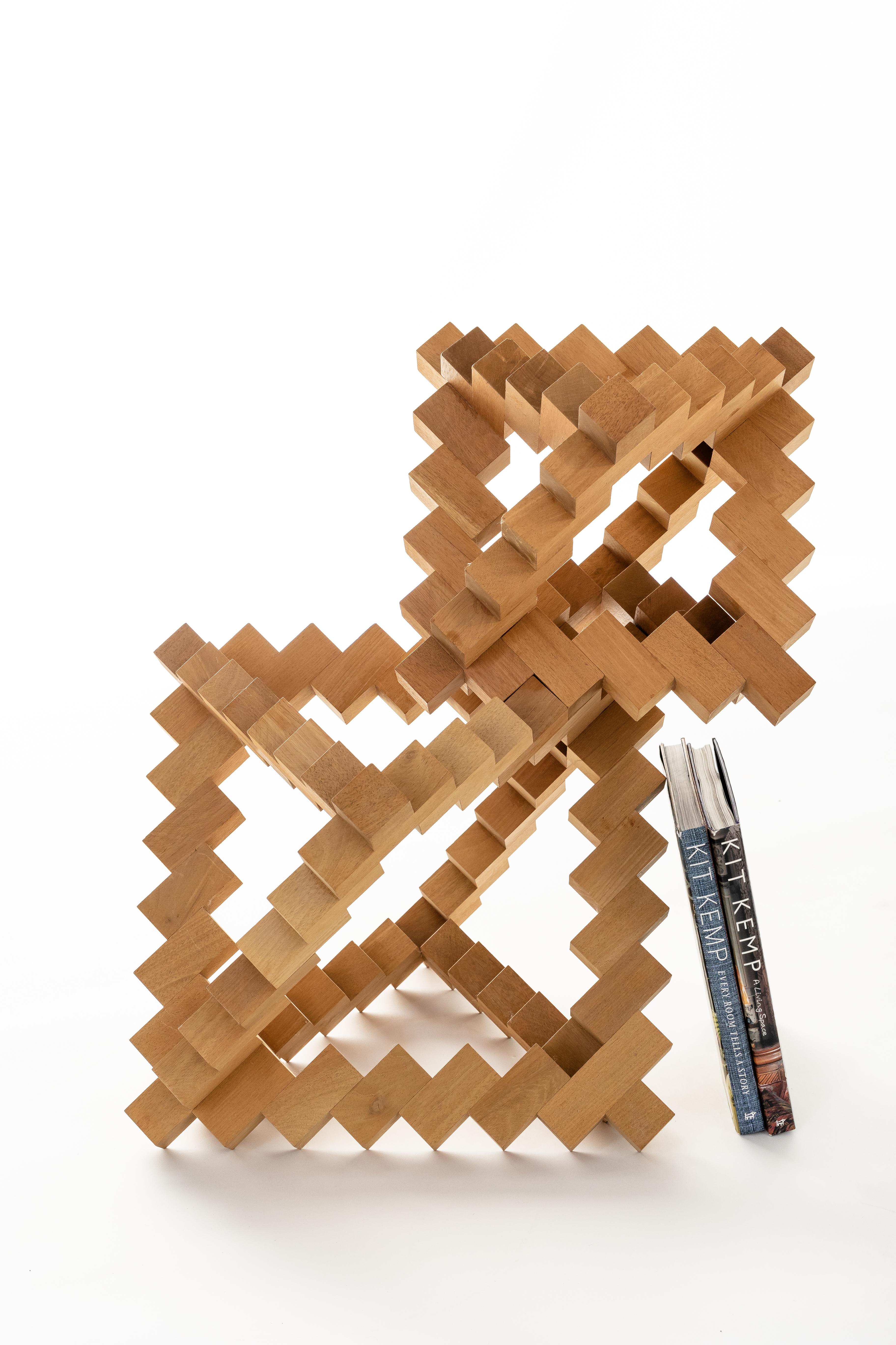 Beautiful open geometric abstract wooden sculpture made by Morton Rachofoky.

Dimensions will differ depending on configuration. 

