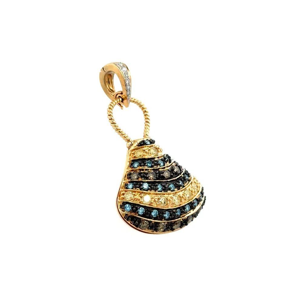 Simply Beautiful! Finely detailed Openable Clam Shell Natural and Treated Diamond Gold Pendant. Securely Hand set with Natural and Treated Diamonds, weighing approx. 1.30tcw. Pendant opens to reveal a Pearl. Pendant size: 1.50” l x 0.90” w. Hand
