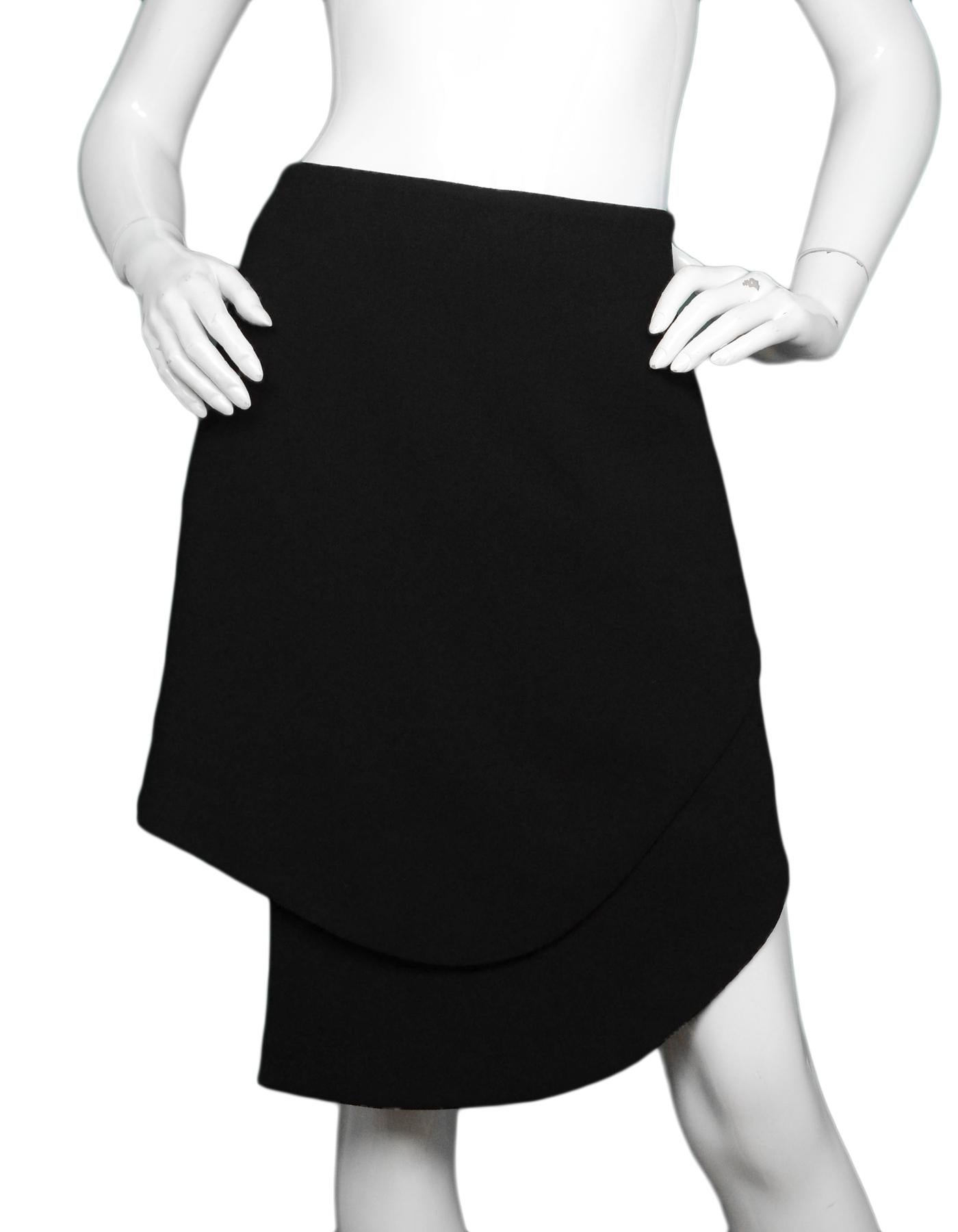 Opening Ceremony Black Asymmetrical Skirt NWT Sz M

Made In: China 
Color: Black
Materials: 100% polyester
Lining:  100% polyester
Closure/Opening: Hidden side zipper with hook eye at top
Overall Condition: Excellent condition with original tags