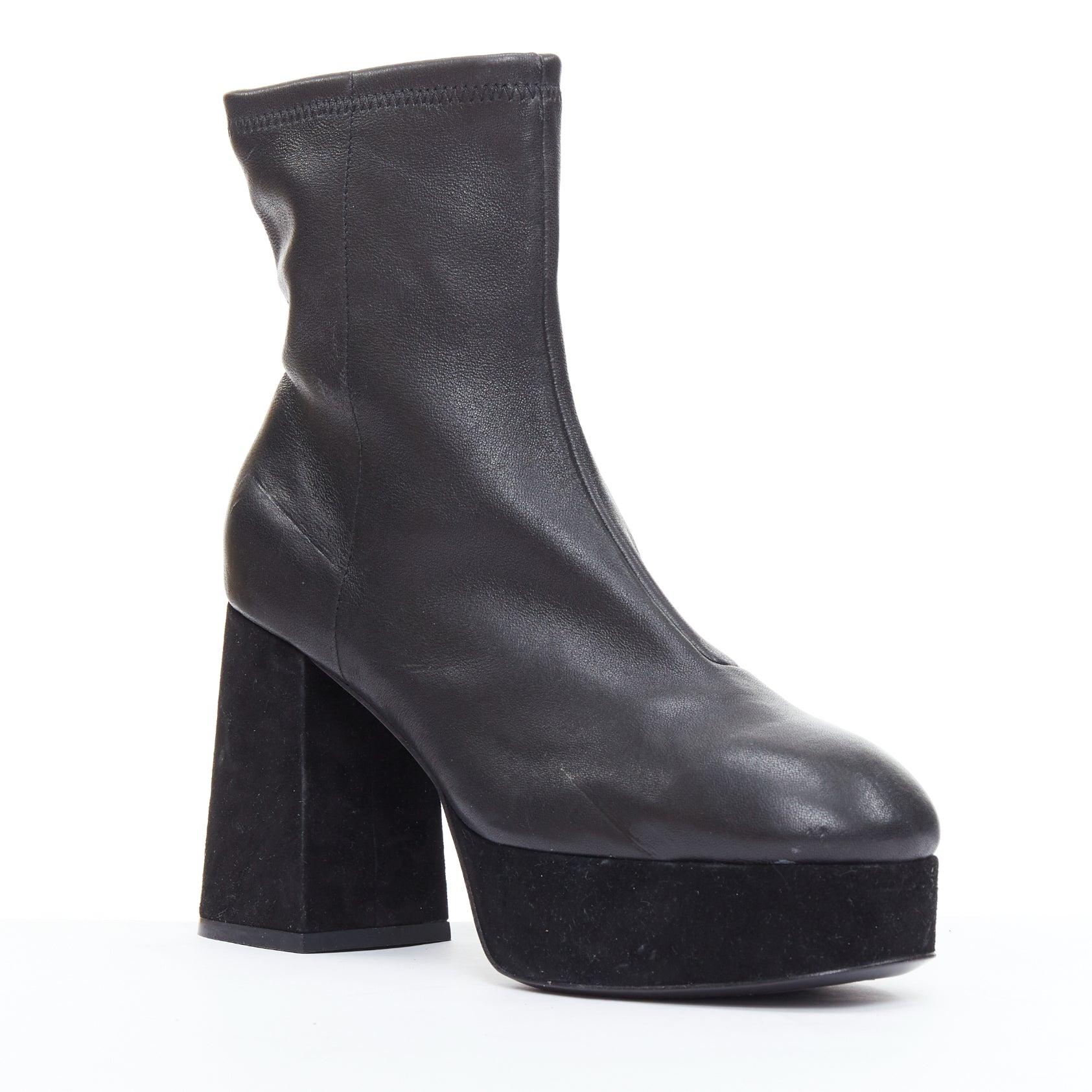 Opening Ceremony bottines en cuir velours noir à plateforme chunky EU38
Référence : ECLO/A00129
Marque : Opening Ceremony
MATERIAL : Cuir, daim
Couleur : Noir
Motif : Solide
Fermeture : Slip On
Doublure : Cuir noir

CONDITION :
Condition : Bon, cet