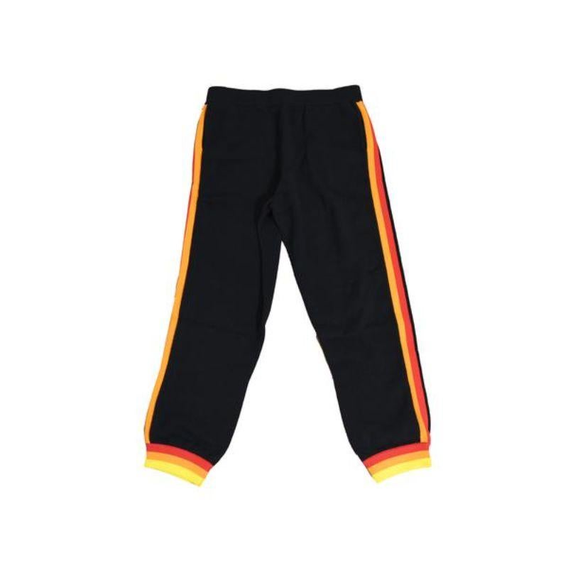 Black pants cheap orange stripe