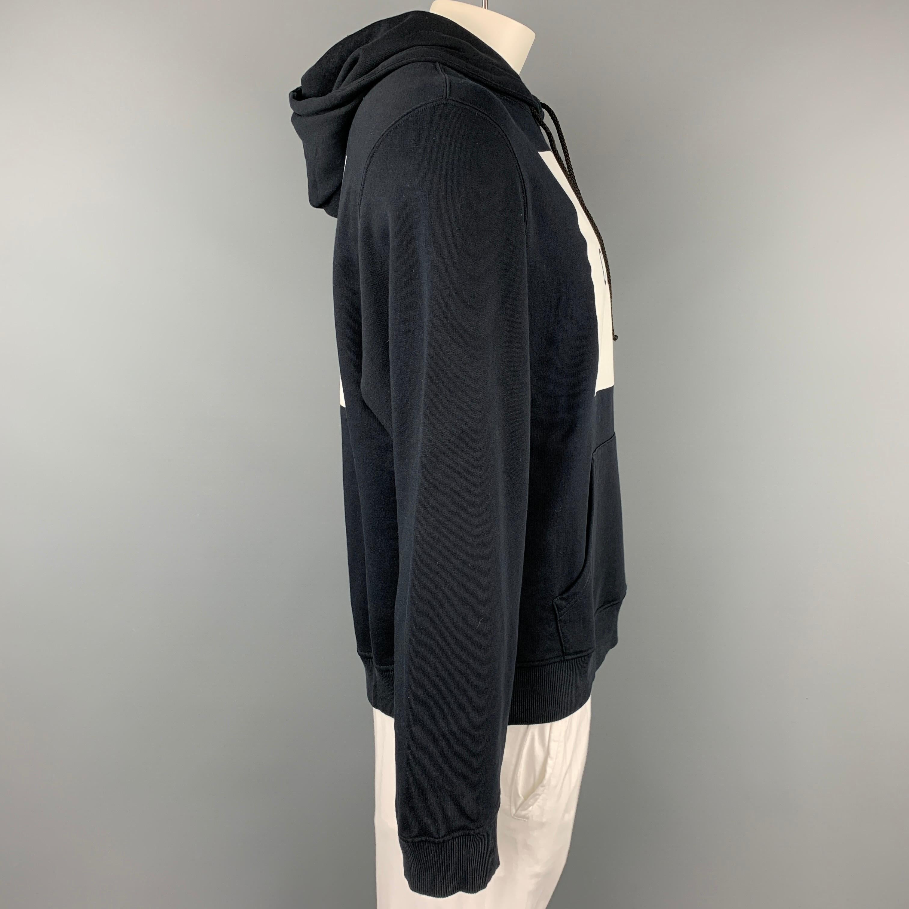 OPENING CEREMONY sweatshirt comes in a black & white cotton featuring a front logo, front pocket panel, hooded, and a drawstring. 

Very Good Pre-Owned Condition.
Marked: XL
Original Retail Price: $330.00

Measurements:

Shoulder: 20.5 in.
Chest: 50