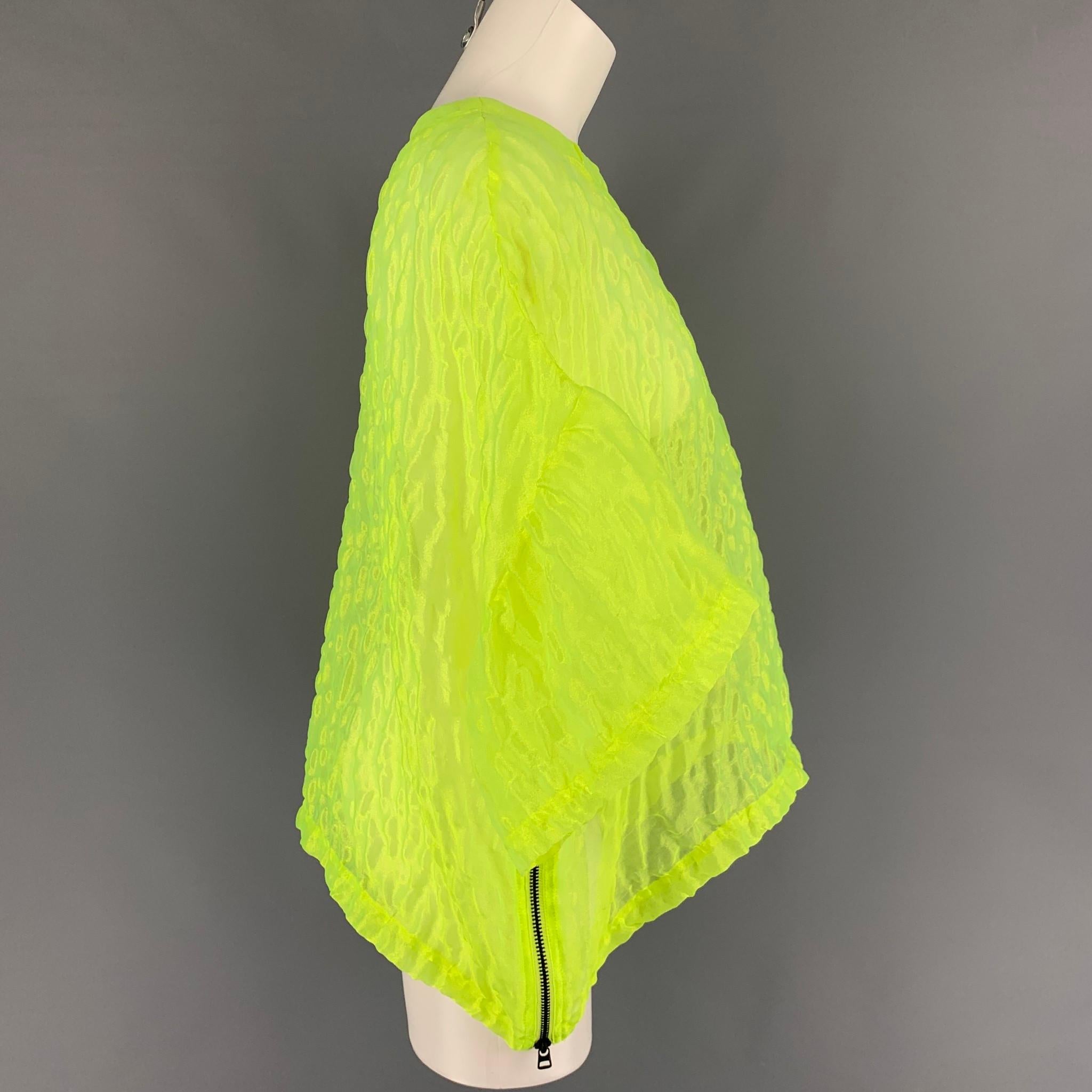 OPENING CEREMONY dress top comes in a neon textured material featuring a oversized fit, side zippers, and a crew-neck. 

New With Tags. 
Marked: XS

Measurements:

Shoulder: 26 in.
Bust: 52 in.
Sleeve: 7 in.
Length: 23 in. 