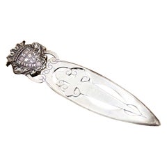 Opens letters in silver with symbols of Portugal, profusely embossed Aviz sword