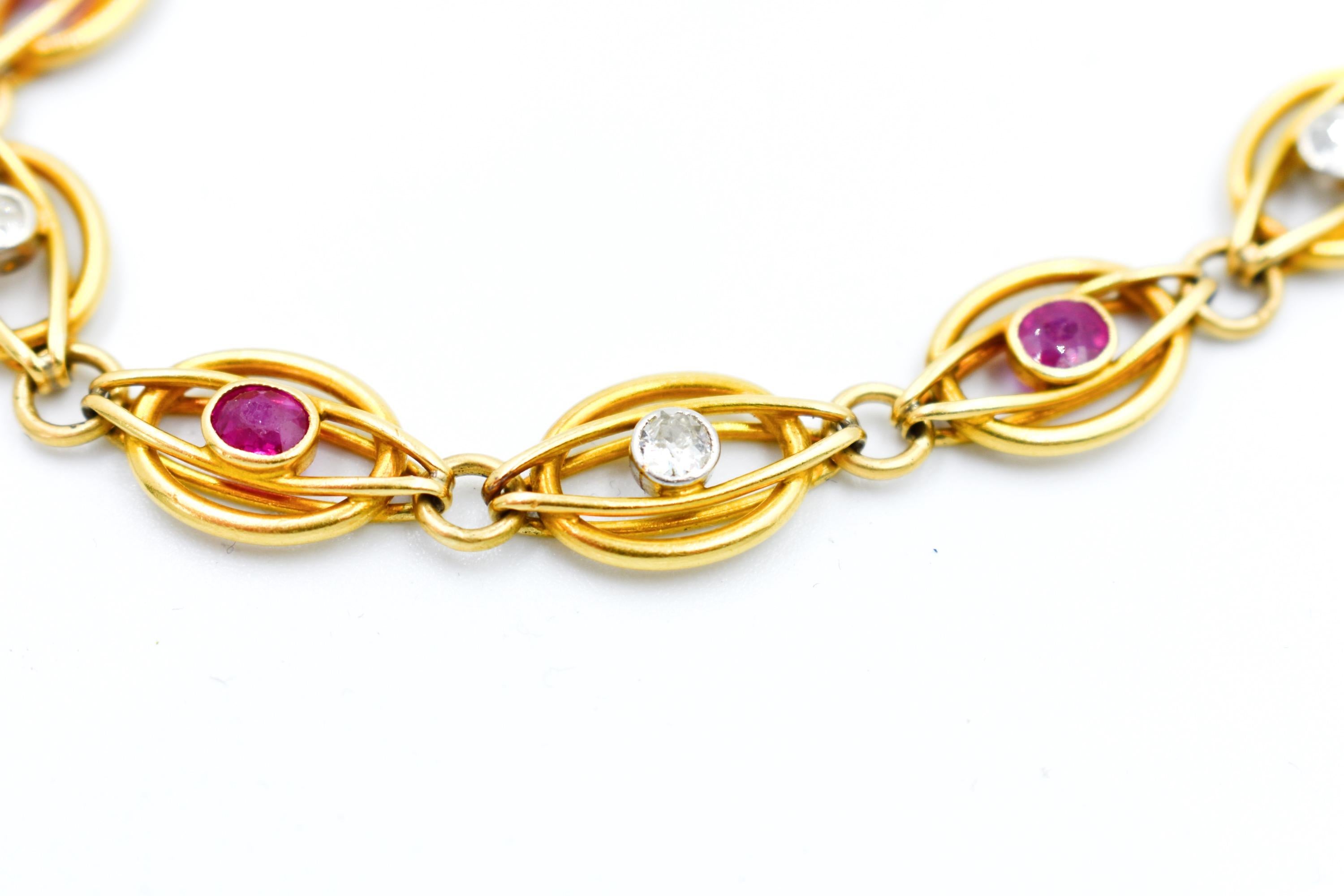 Discover this magnificent vintage bracelet from the 50's and 60's in 18-carat gold, a true period jewel evoking elegance and retro charm. This bracelet is composed of 10 openwork links, harmoniously alternating a ruby and a diamond in their