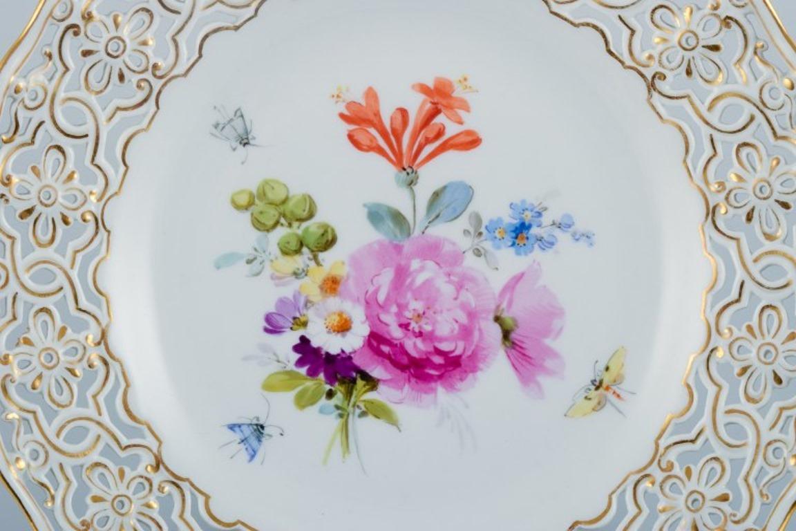 Meissen, Germany, openwork porcelain plate hand painted with flowers and butterflies.
Wide openwork with gold decoration.
Early 20th century.
Perfect condition. Seemingly unused.
First factory quality.
Marked.
Dimensions: D 21.0 cm.



