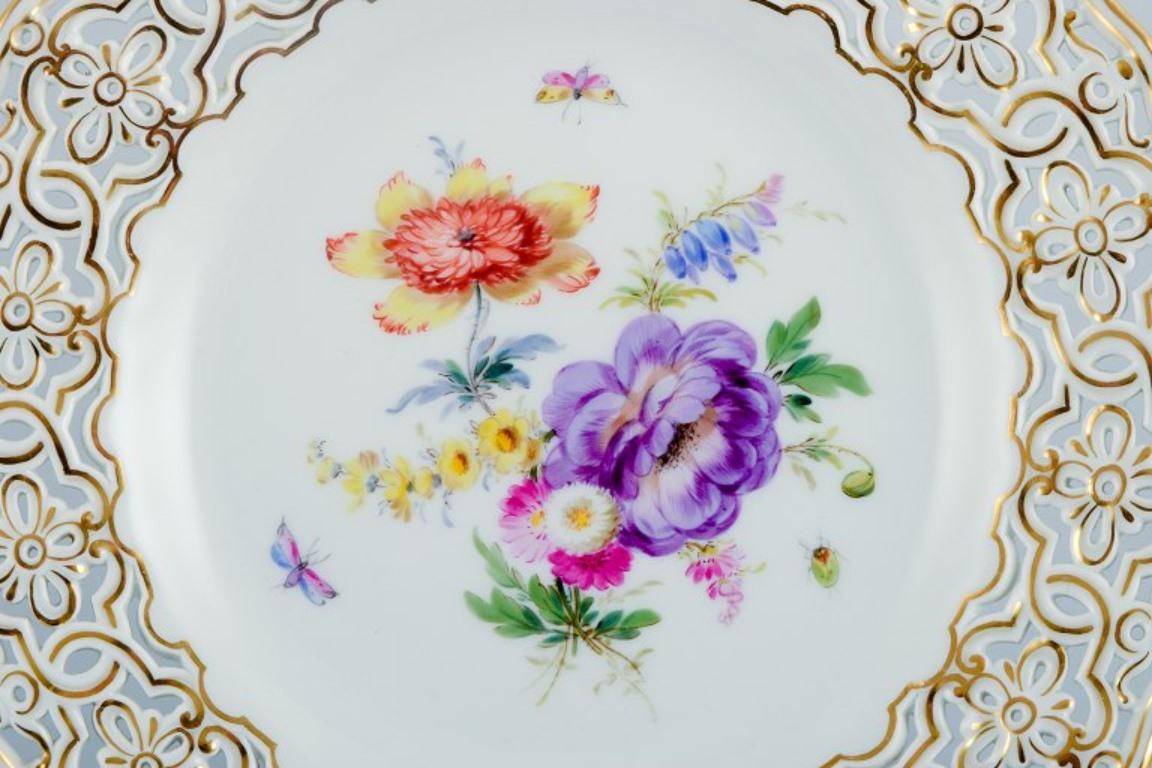 Meissen, Germany, openwork porcelain plate hand painted with flowers and butterflies.
Wide openwork with gold decoration.
Early 20th century.
Perfect condition. Seemingly unused.
First factory quality.
Marked.
Dimensions: D 21.0 cm.



