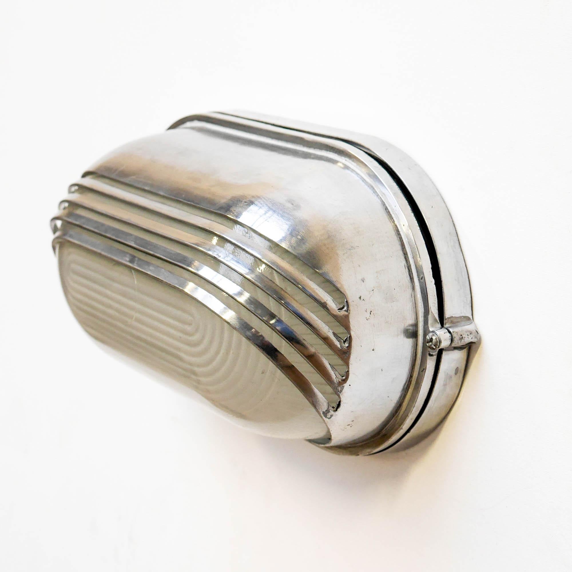 English Openworked Wall Light Large, in Polished Aluminium and Reeded Glass, circa 1970