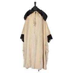 Opera coat in ivory silk velvet with black furs  Circa 1920's Stern Brother