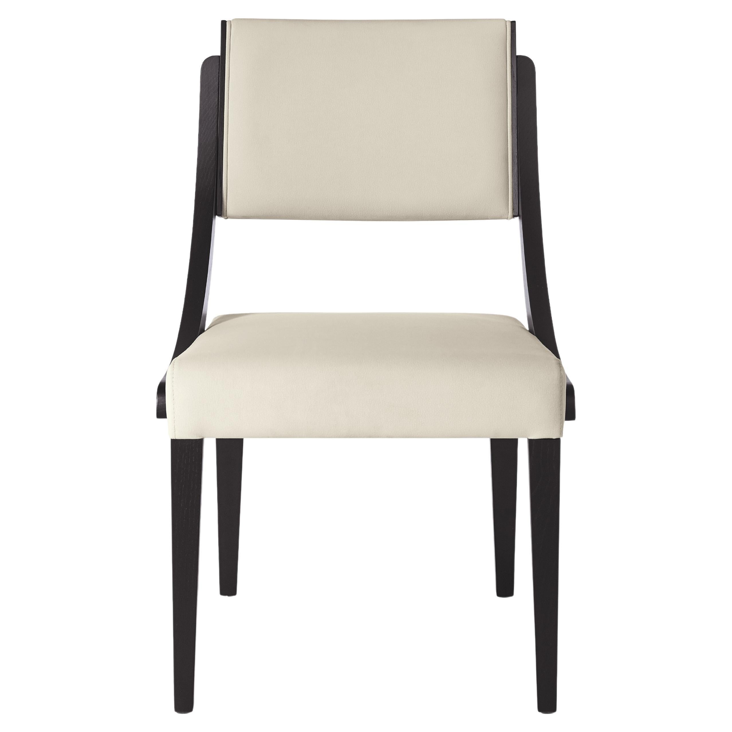 The minimalistic design of the chair brings a sense of sophistication while maintaining comfort. Constructed of black oak frame and upholstered in high quality cream leather.
Available in COM.
“Minimum order of 4 chairs.”
Contact us to enquire about