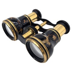 Gemelos de ópera con su estuche original de cuero azul, inglés circa 1900