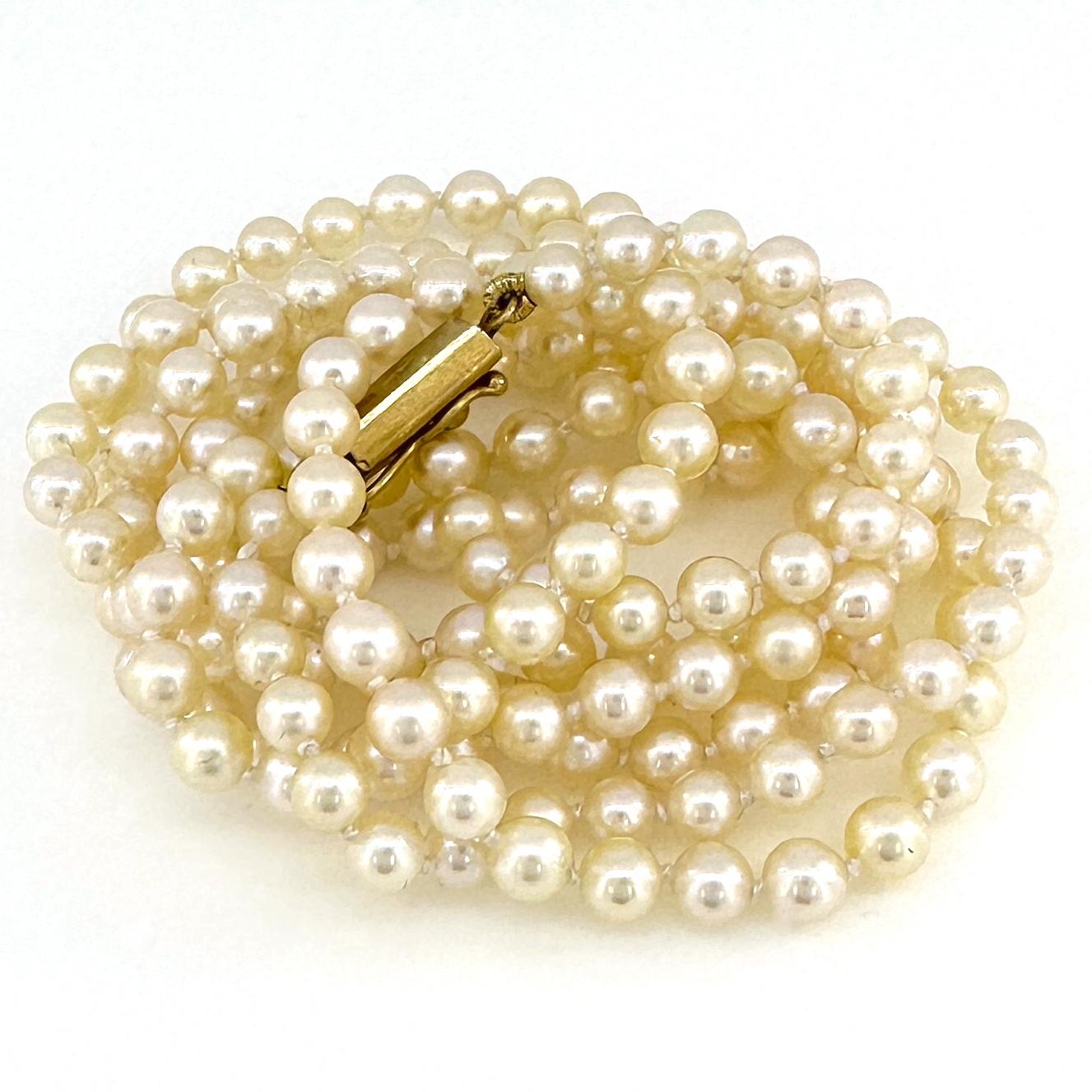 Contemporary Opera Length Strand of Japanese Akoya Cultured Pearls with 14k Gold Clasp