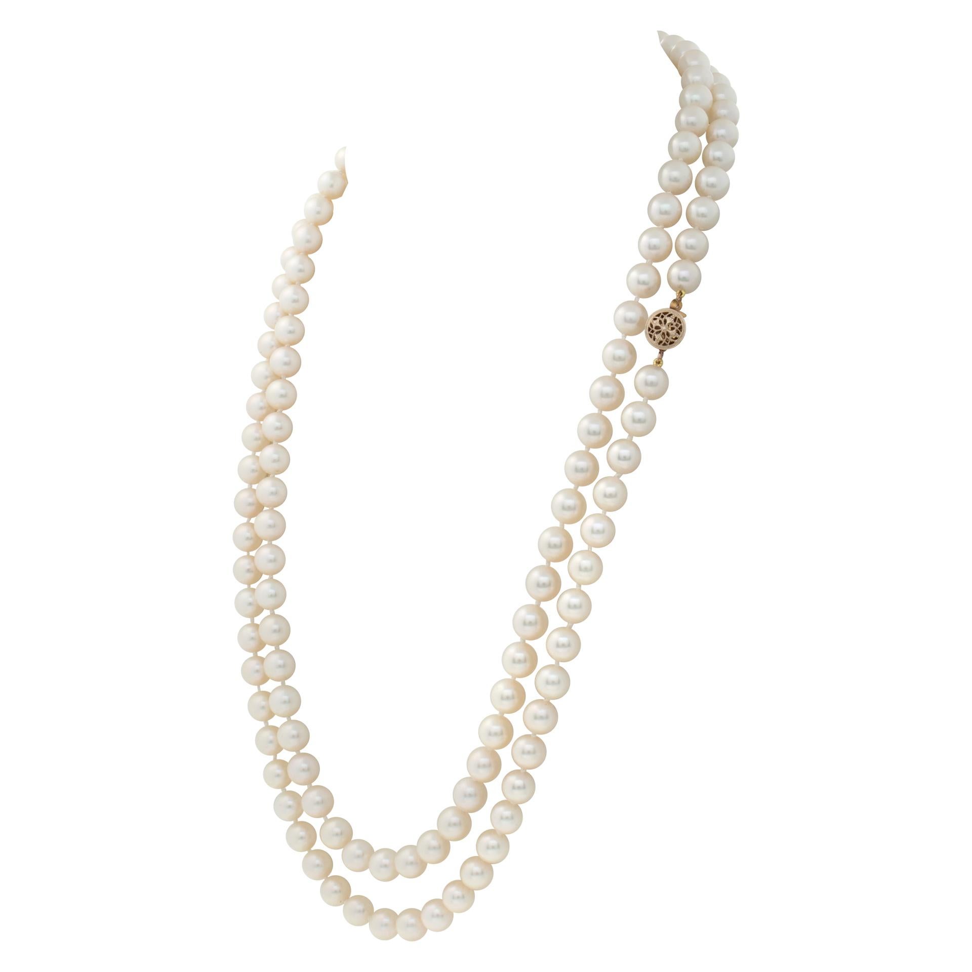 Opera Length Strand Of Akoya Pearl Necklace With A Yellow Gold Clasp In Excellent Condition For Sale In Surfside, FL