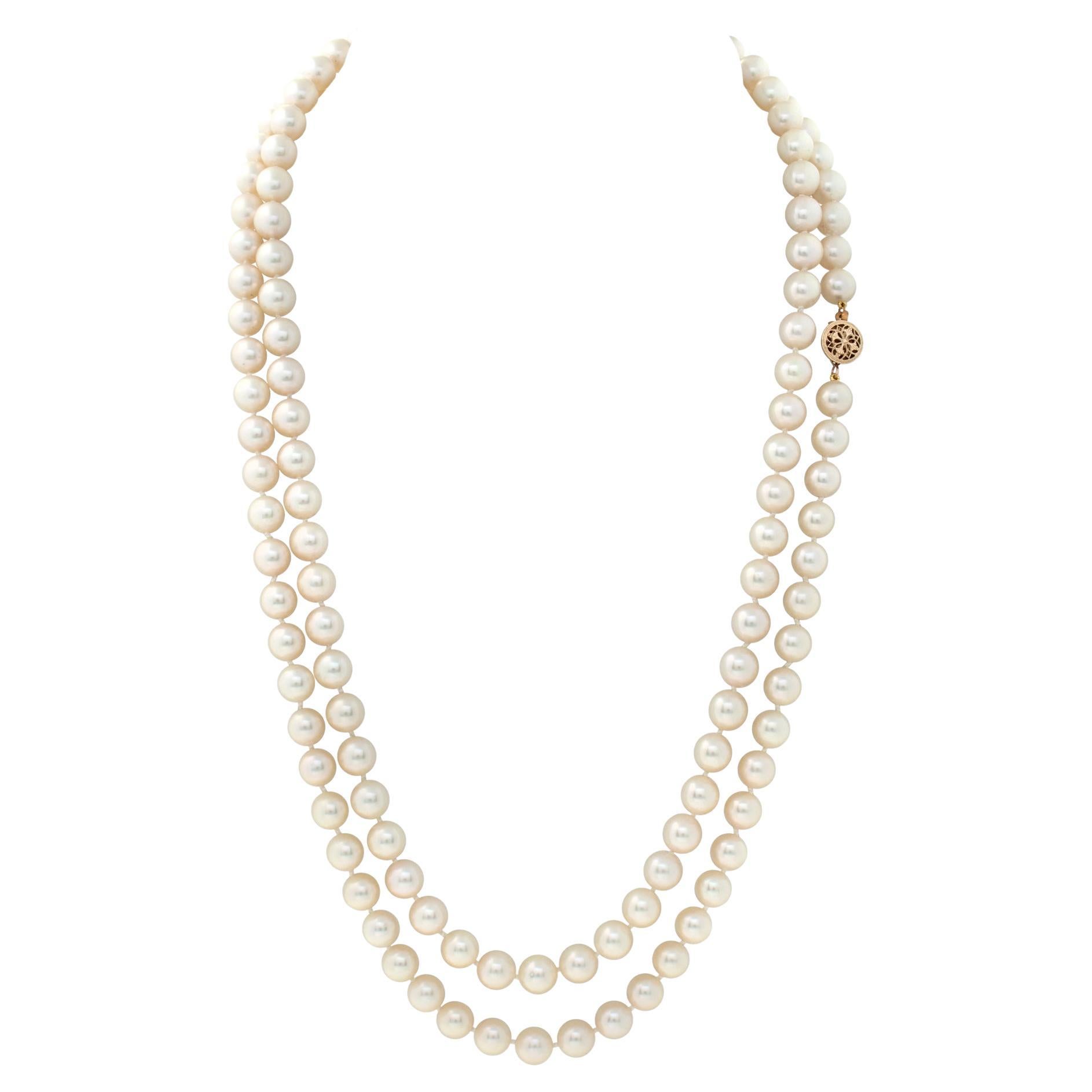 Opera Length Strand Of Akoya Pearl Necklace With A Yellow Gold Clasp For Sale