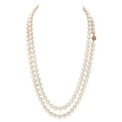 Vintage Opera Length Strand Of Akoya Pearl Necklace With A Yellow Gold Clasp