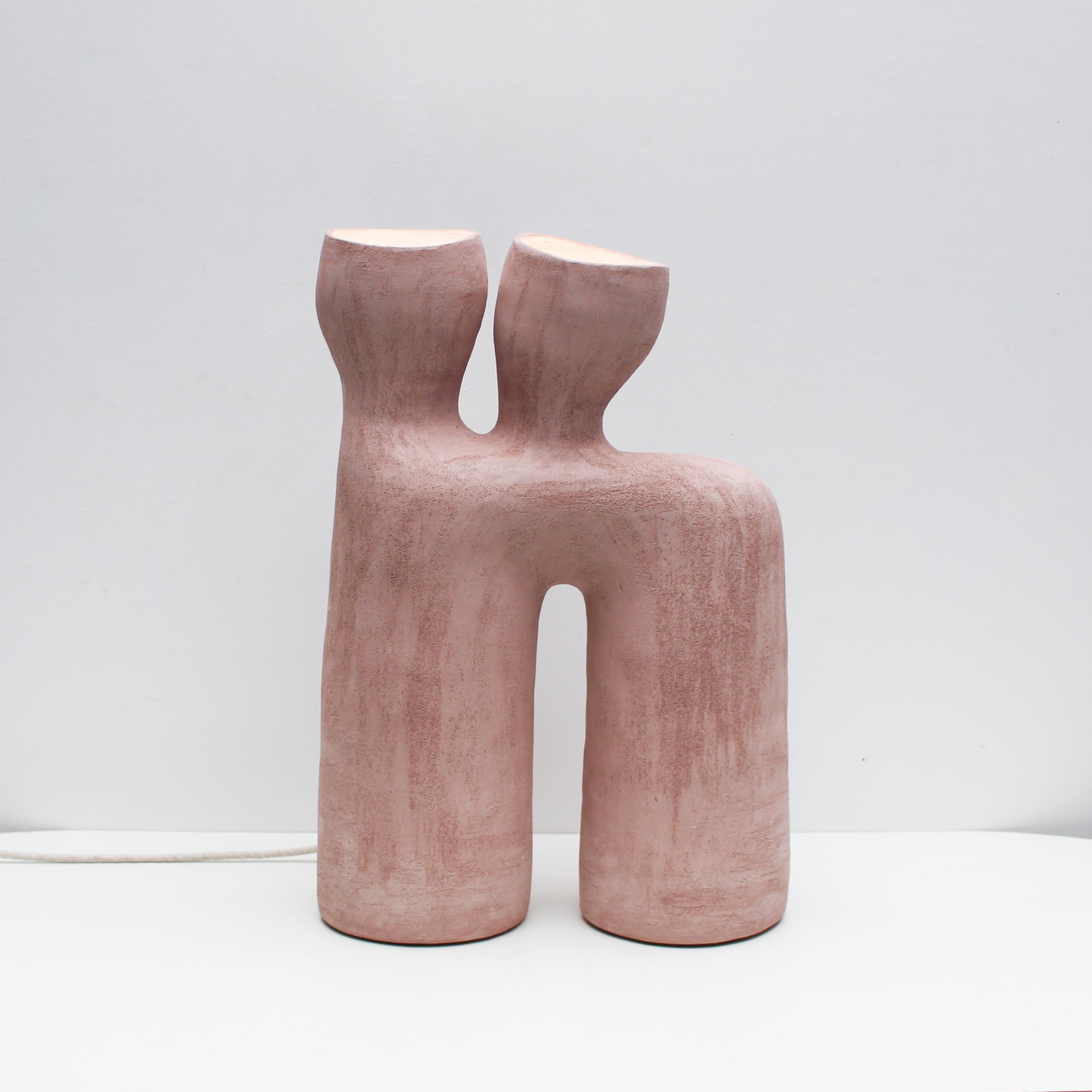 Opéra pink stoneware table lamp by Elisa Uberti
Materials: Pink Stoneware
Dimensions: 55 x 36 x 17 cm

After fifteen years in fashion, Elisa Uberti decides to take the time to work with these hands and to give birth to new projects.

Designer and