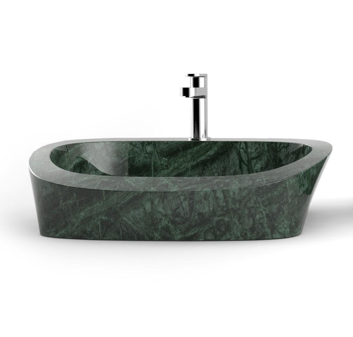 Opera Romeo washbasin by Marmi Serafini
Materials: Verde Guatemala marble.
Dimensions: D 48 x W 58 x H 17 cm
Available in other marbles.
Tap not included.

One of the most beloved operas set in stone and following the storylines of the most famous