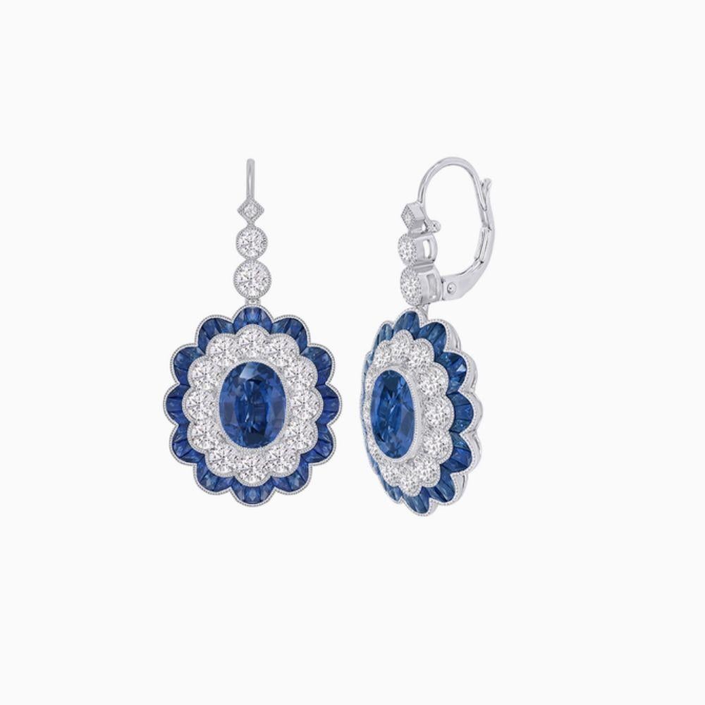 Exceptional earrings.  From the fine hand cut and crafted ceylon french cut sapphires to the quality and size of the round diamonds.  Perfect for any occasion, these earrings are spectacular.  

Metal Type : 18K White Gold
Metal Weight : 8.64