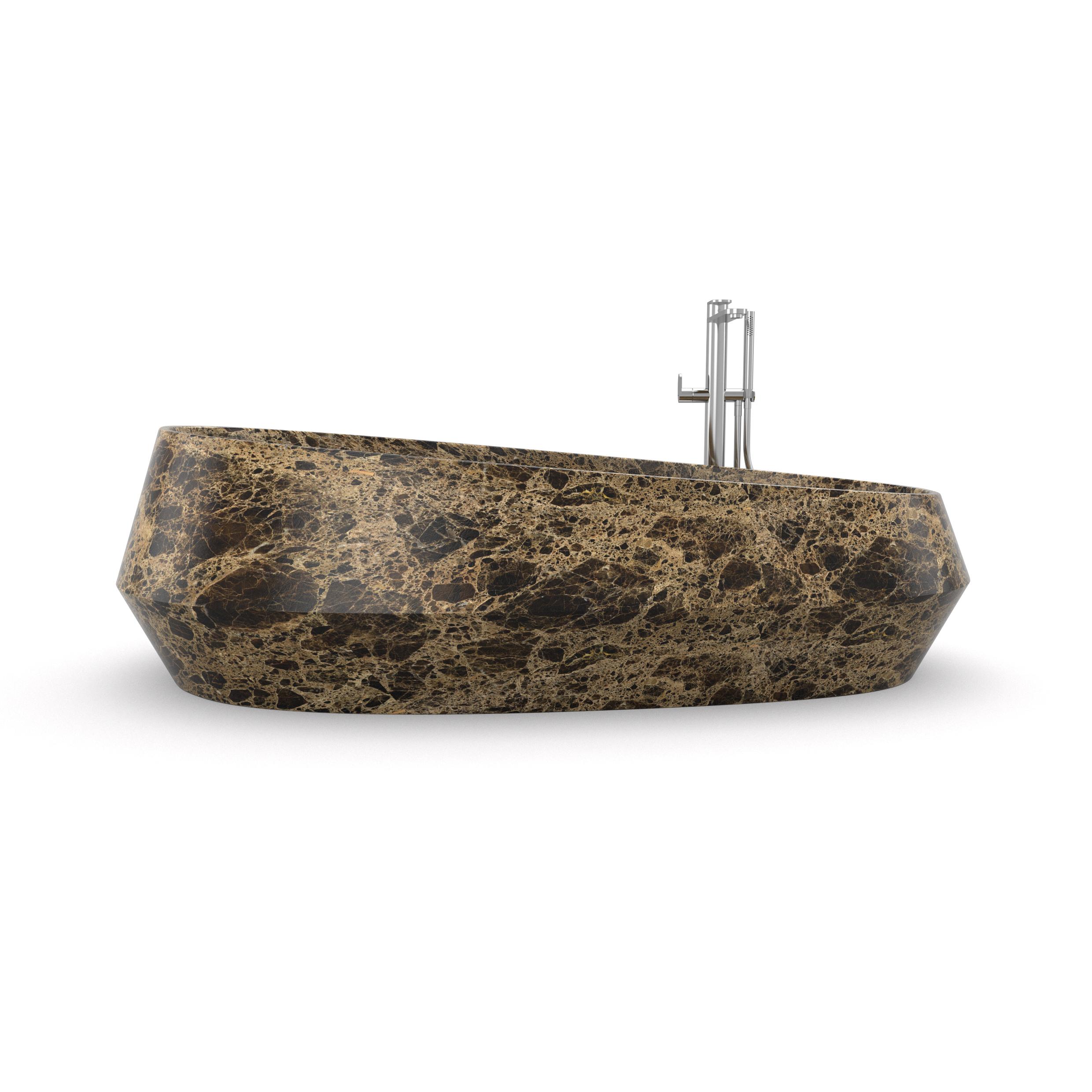Opera Tosca bath by Marmi Serafini
Materials: Emperador Brown marble.
Dimensions: D 92 x W 170 x H 50 cm
Available in other marbles. Also available in shaped version.
Tap not included.

The large dimensions and the elegant silhouette certainly does