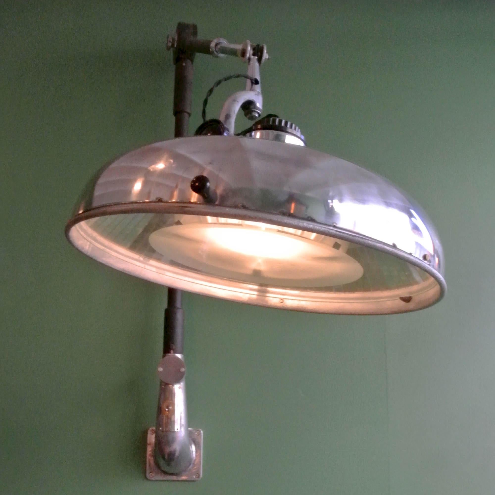 Old operating lamp Scialytique - BBT, formerly used in surgery, fully restored (stripped, polished, patinated and rewired). Swivel head composed of mirrors inside that spreads light uniformly. With no cast shadows, possibility to adjust the lens