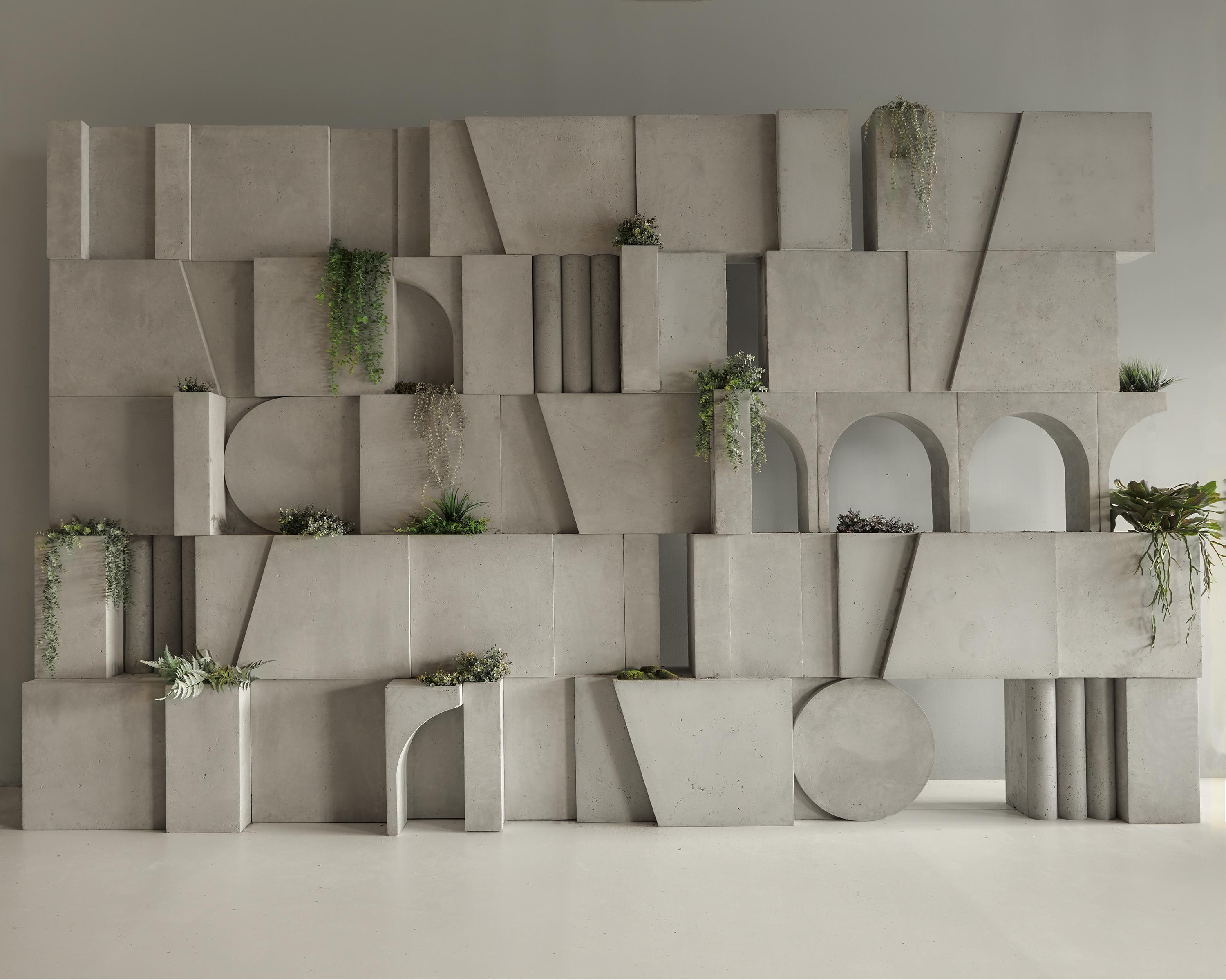 Spolia Wallscape is a family of new architectural wall treatments from Brooklyn based Biophilic design Studio OPIARY. It’s a system of bold geometric modular hollow concrete blocks in stackable rows. It can be a freestanding wall or screen or tiles