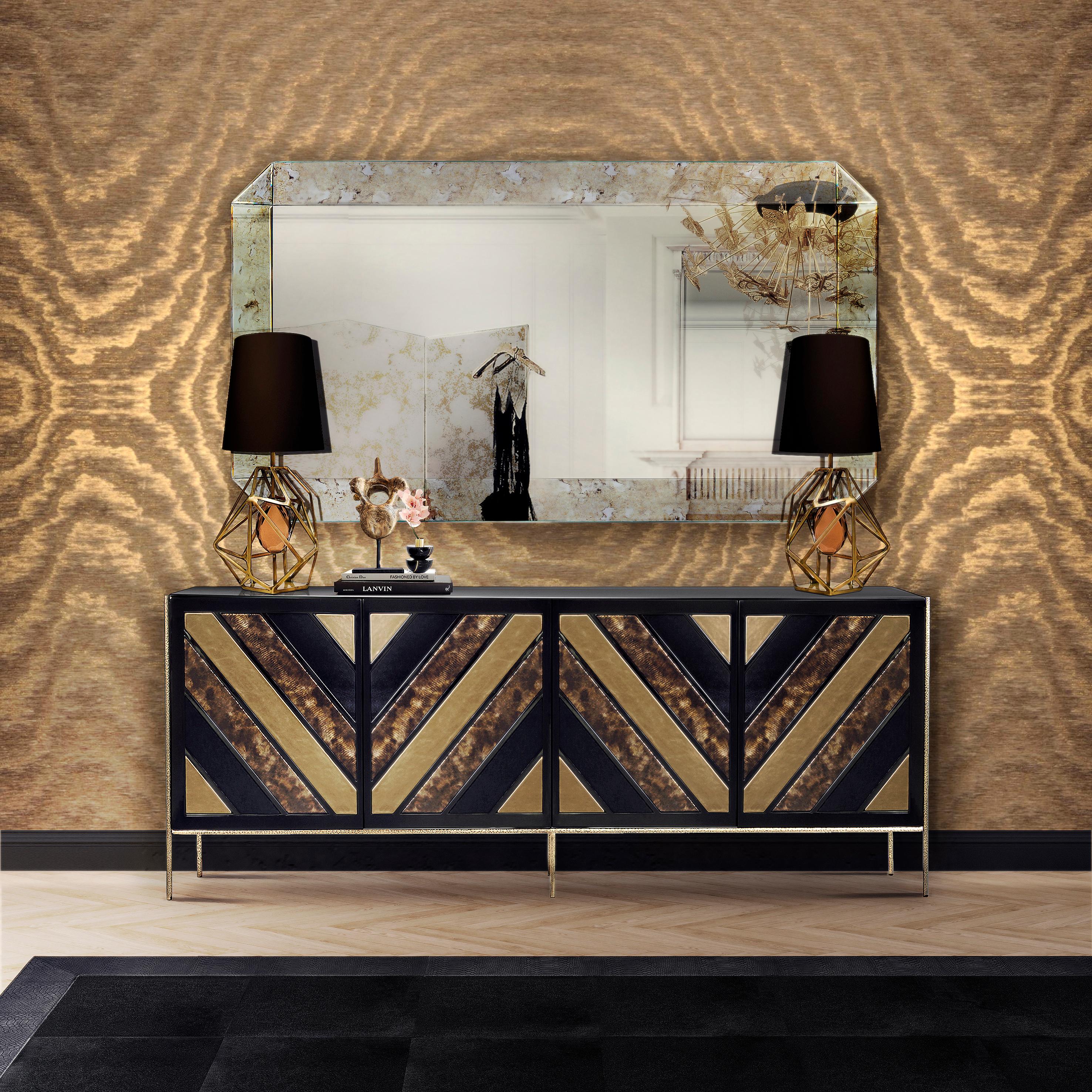 The geometric design and exotic finishes of the Opium Cabinet will seduce you into a euphoric haze. Decadent, shimmering and natural leathers adorn the four front doors, while sleek and glossy lacquer covers the body. Peek inside to discover four