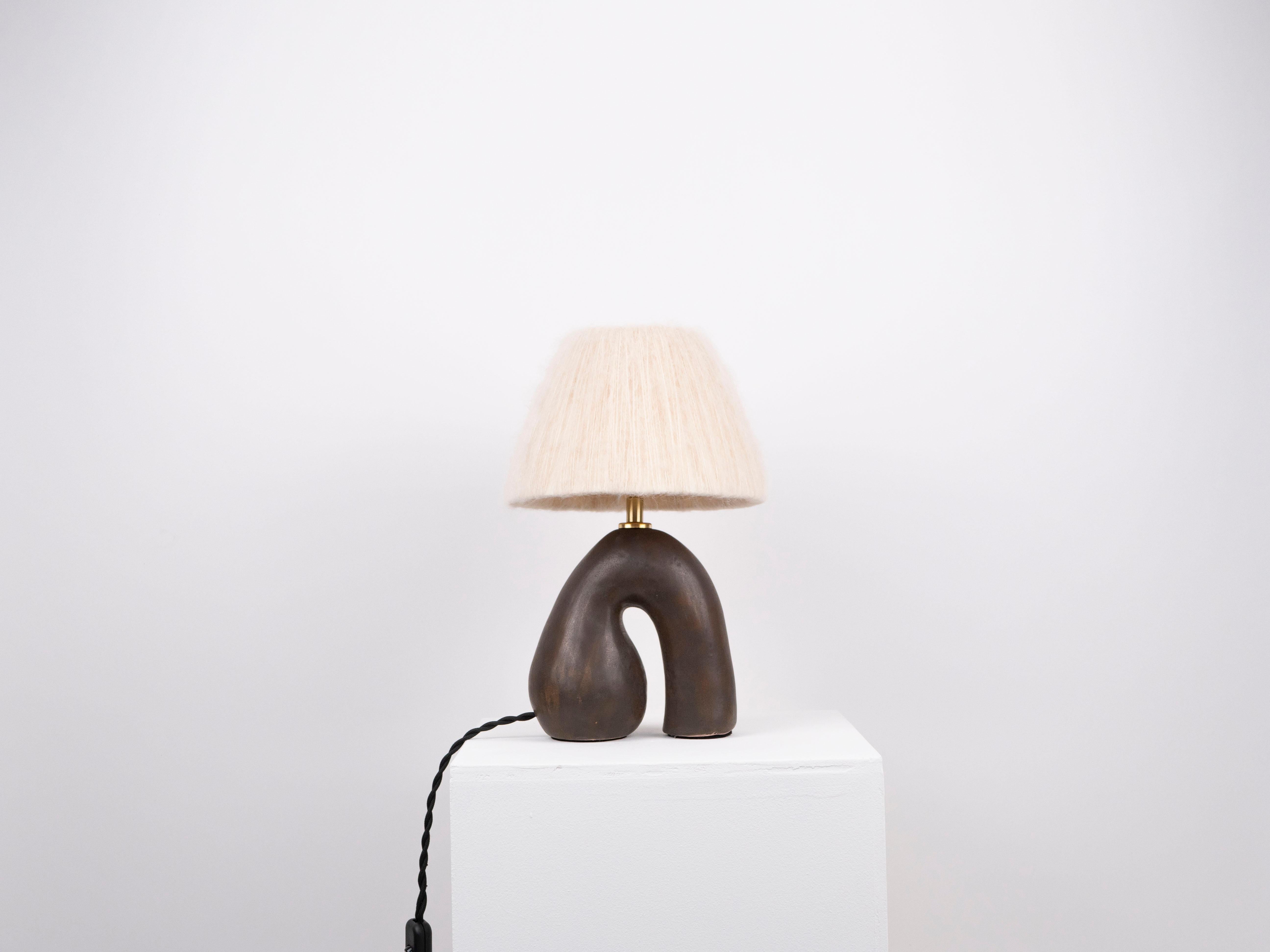 Dark Brown base with a satin finish paired with a Cream wool lampshade

Bulb NOT included
Recommended bulb fitting: E27/26 
Recommended bulb type: Mini Globe LED

The estimated processing time is 2 weeks from order confirmation.

As each item is