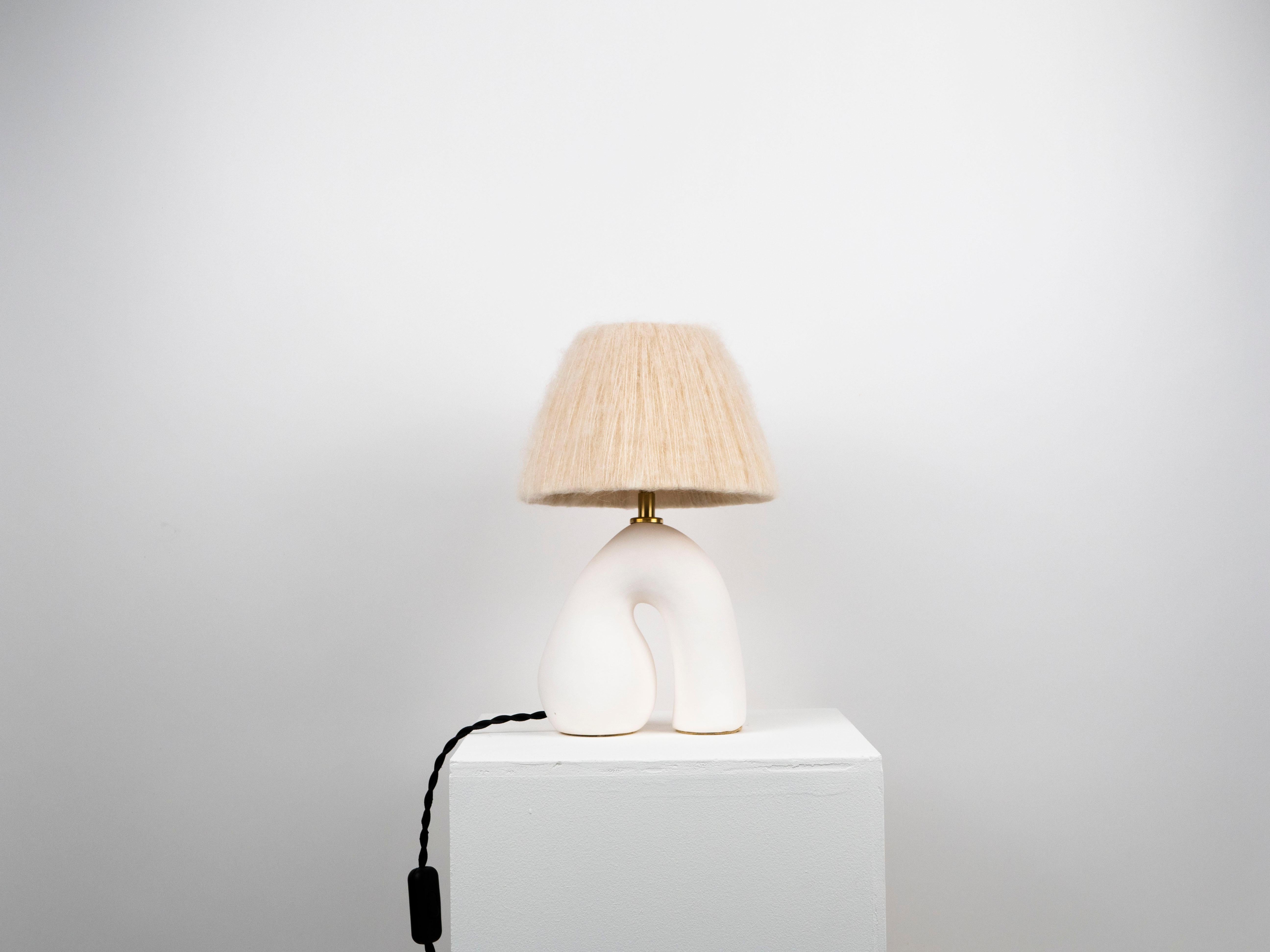 White base with a Matte finish and Cream wool shade

Lamp & Shade: 33 x 20 x 20cm 

Estimated processing time is 2 weeks from order confirmation

Pictured with a Mini Globe LED E27 Bulb. Bulb not included

To pair this base with a shade in an