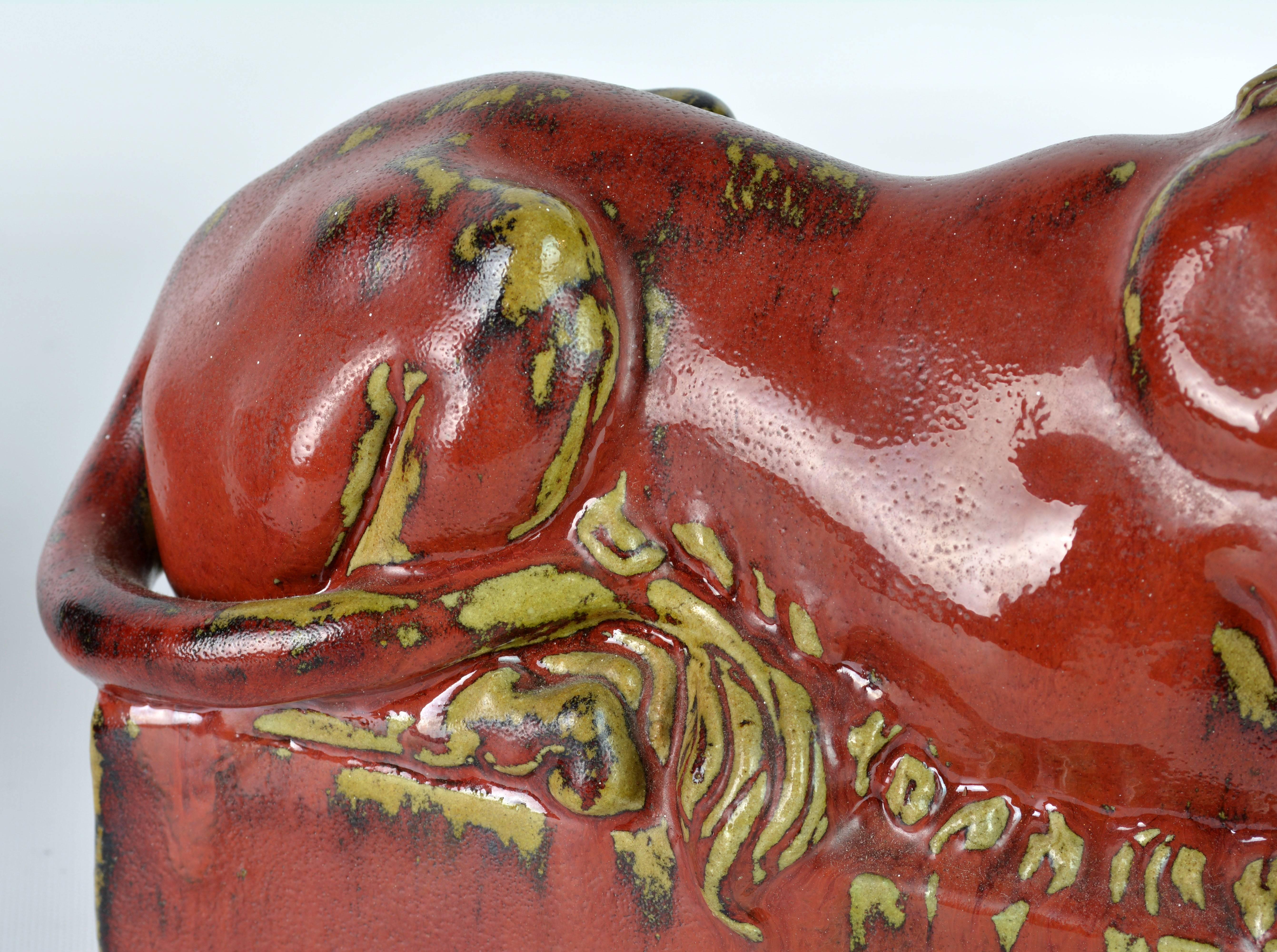 Opposing Pair of 20th Century Oxblood and Celadon Glazed Ceramic Resting Lions 5