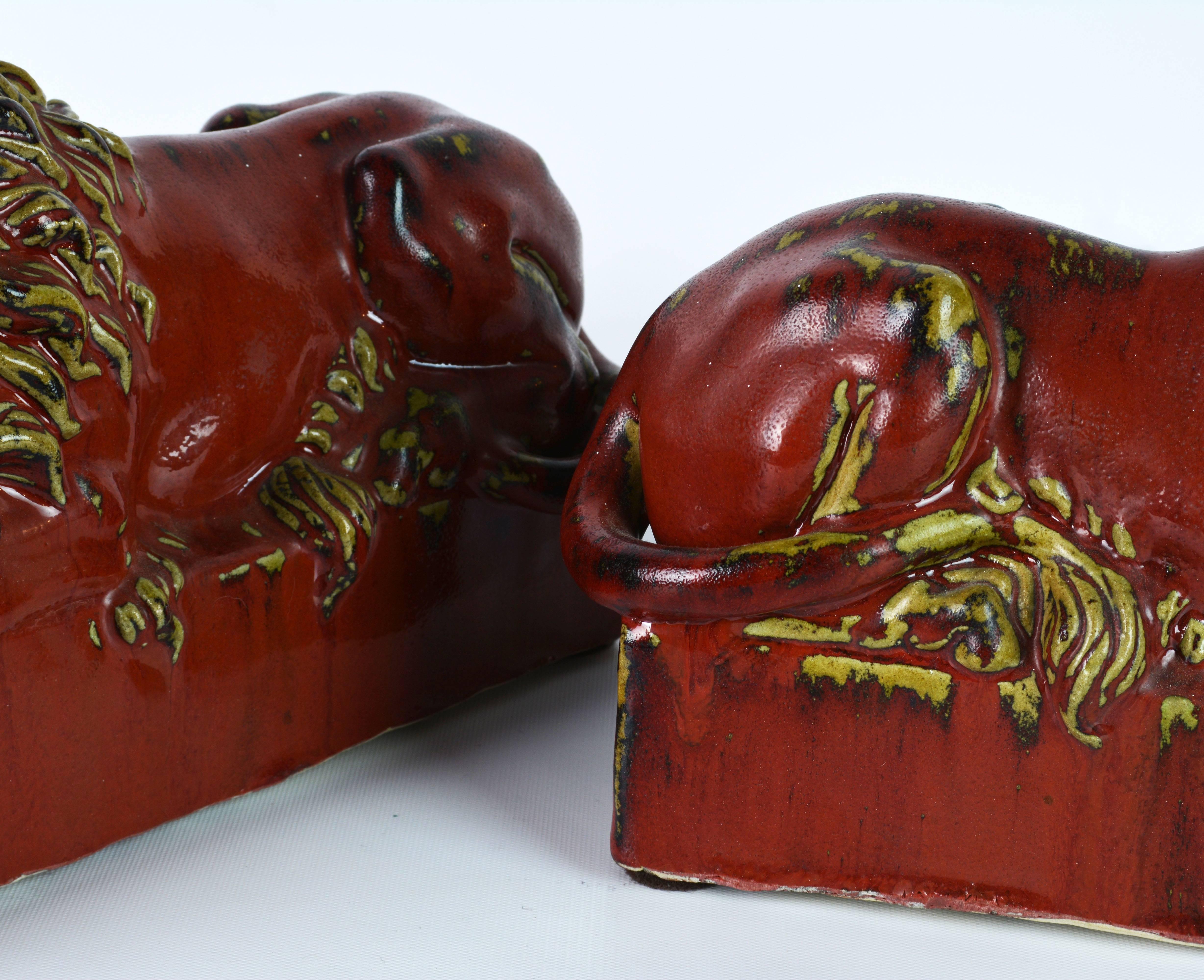 Opposing Pair of 20th Century Oxblood and Celadon Glazed Ceramic Resting Lions 9