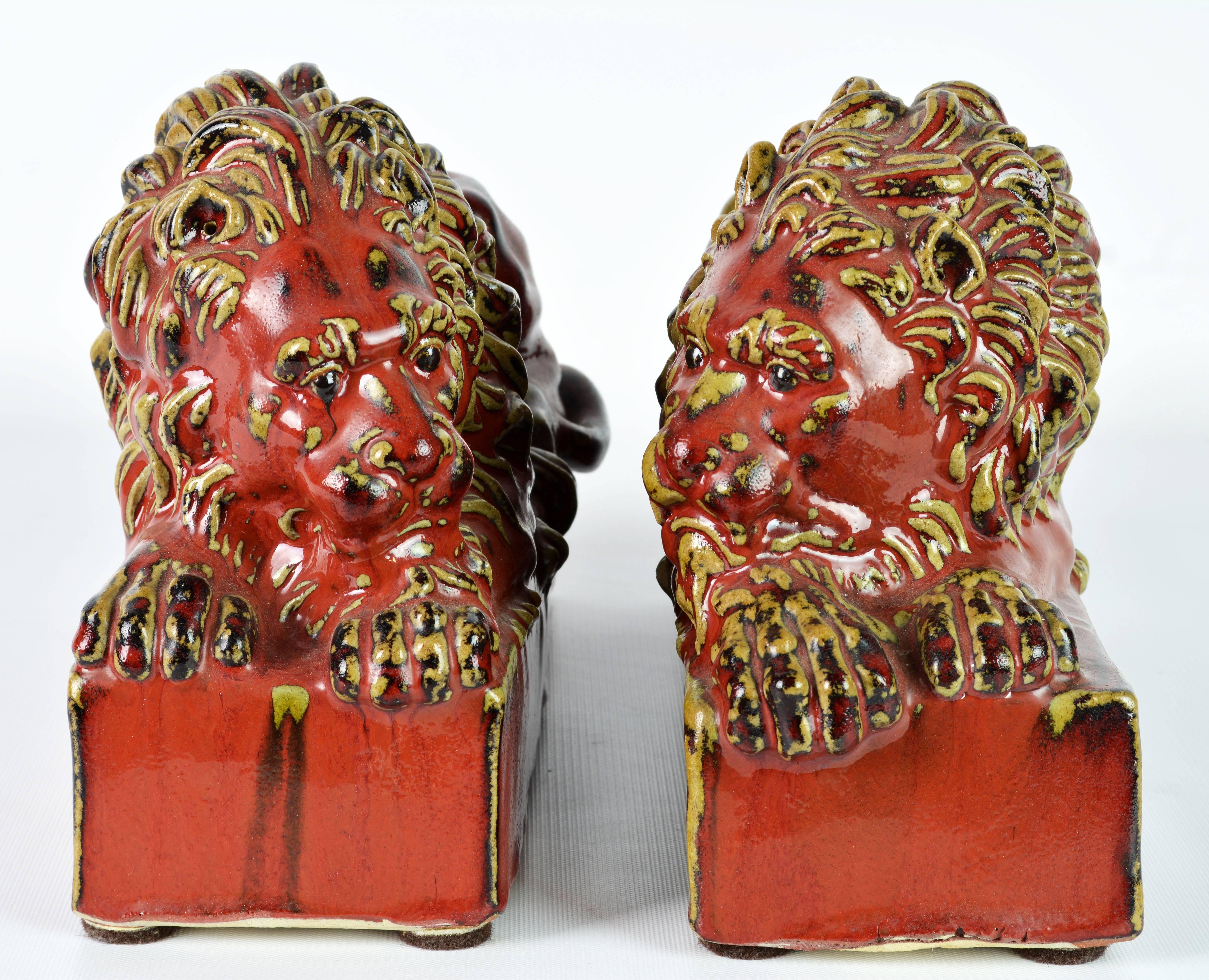 Opposing Pair of 20th Century Oxblood and Celadon Glazed Ceramic Resting Lions 2