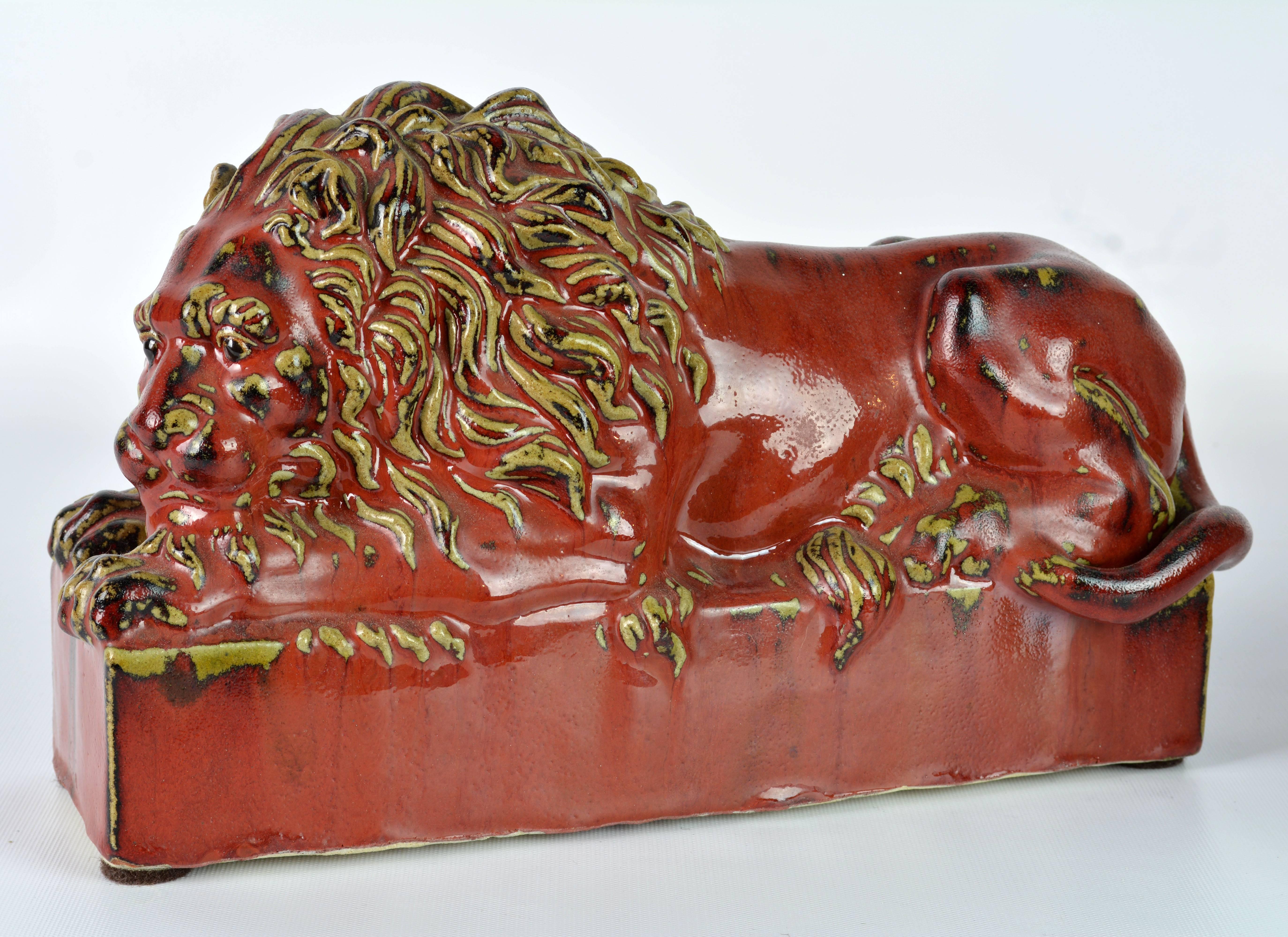 Opposing Pair of 20th Century Oxblood and Celadon Glazed Ceramic Resting Lions 4