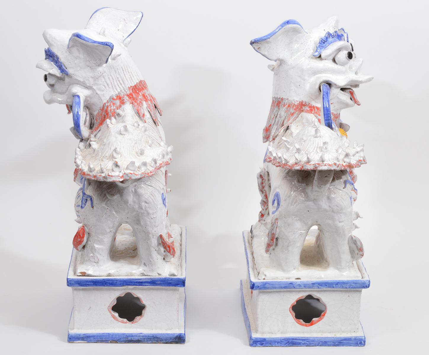Chinoiserie Opposing Pair of Italian Ceramic Glazed Foo Dogs on Bases Manner Ugo Zaccagnini