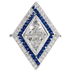 “Opposing Trillions” Diamond and Sapphire Ring
