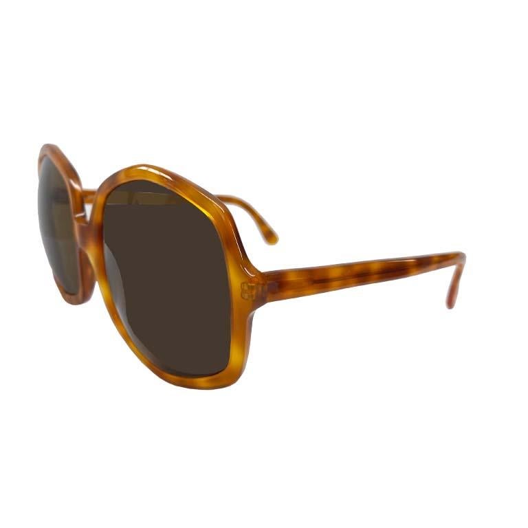 Optical Affairs Series 6555 amber acetate sunglasses with brown lenses. Octagon shaped. Handmade in Austria in 1992. Collector's Item. Rare. Unworn. Optical Affairs feminine - provocative size - sunglasses on men in the 1990’s became the precursor