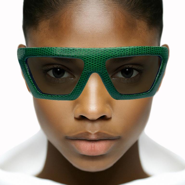 Optical Affairs Series KL2. This one-of-a-kind collector’s item has genuine green lizard skin wrapping the entire frame with precision and true craftsmanship. A luxurious take on Optical Affairs’ iconic sunglasses, designed in New York and